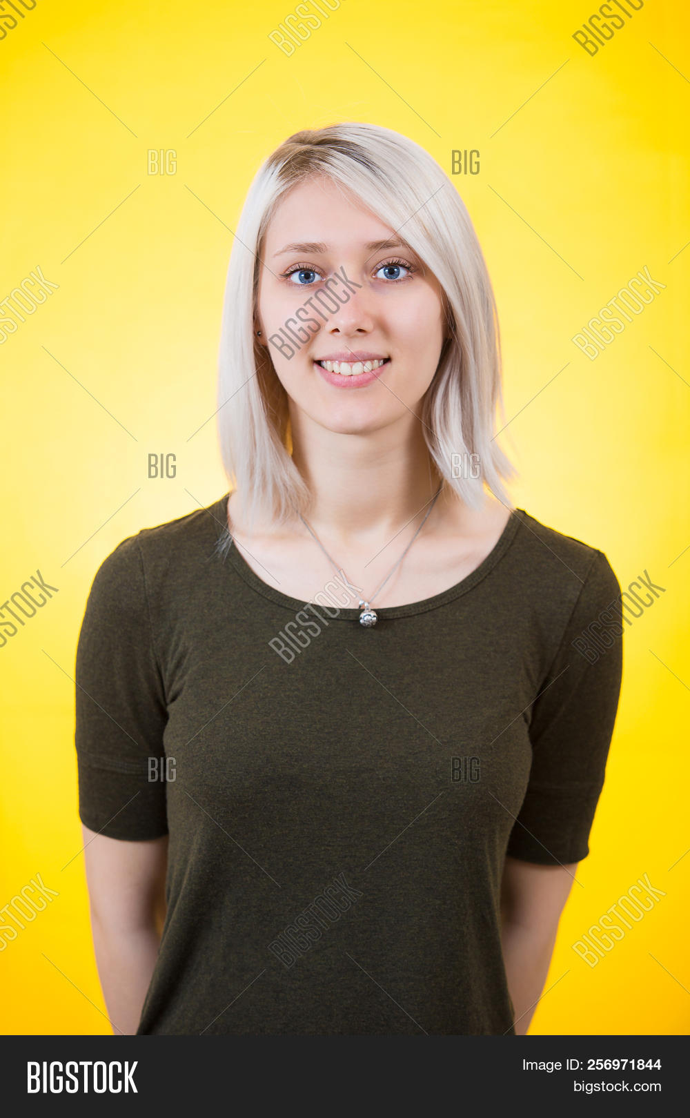 adult,attractive,back,background,beautiful,beauty,behind,blonde,blue,caucasian,cheerful,clothing,concept,cute,eyes,fashion,female,fresh,fun,girl,hair,hands,happy,holding,isolated,jersey,model,modern,person,portrait,posing,pretty,shot,singlet,smile,smiling,sporty,standing,studio,style,t-shirt,teenage,teenager,tight,white,woman,women,yellow,young