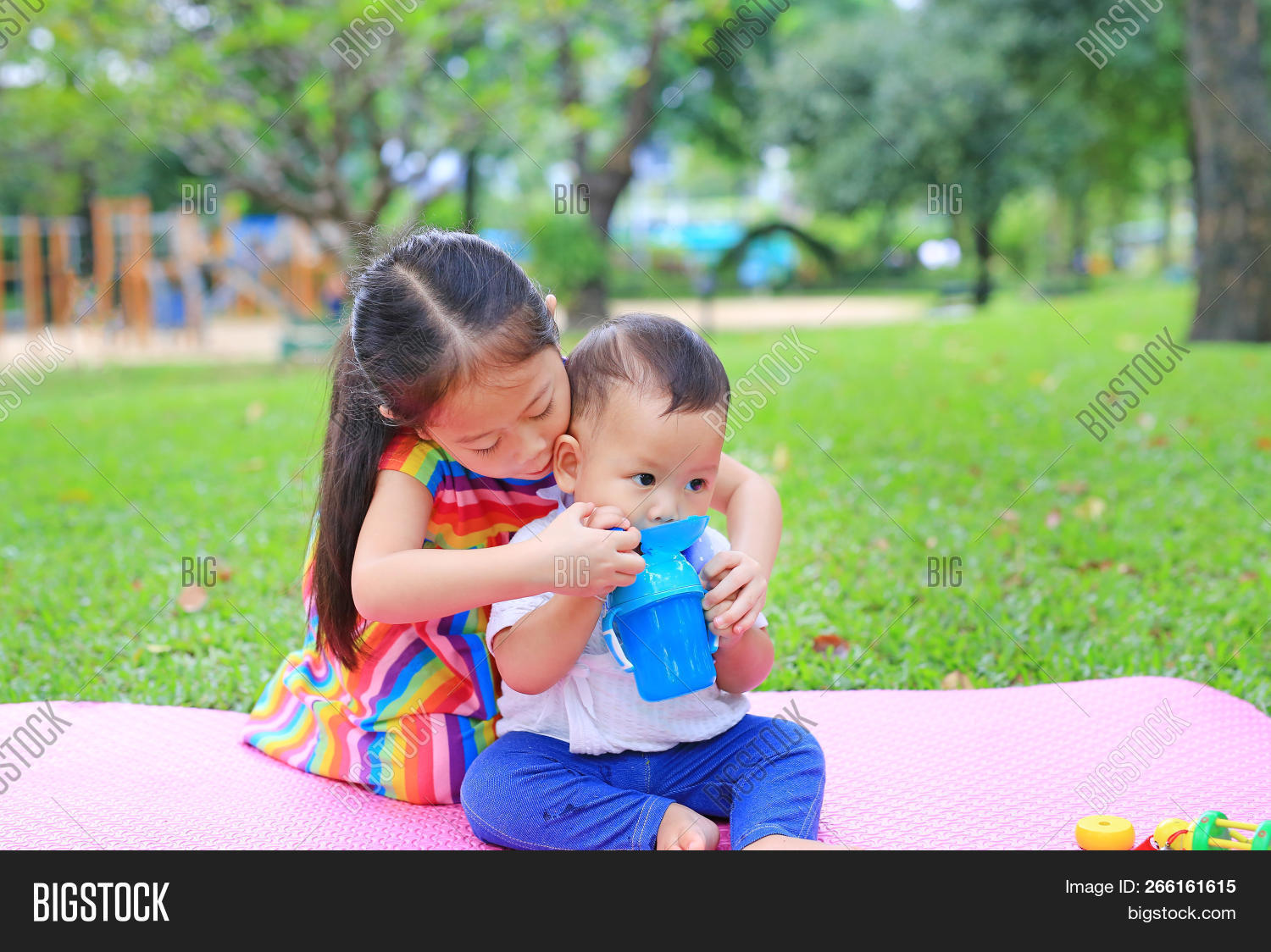 asia,asian,babe,baby,bottle,boy,brother,care,caucasian,child,childhood,children,cup,cute,drink,eat,feed,female,food,garden,girl,grass,green,happiness,happy,health,hungry,infant,kid,liquid,little,love,male,mattress,park,people,sipper,sippy,sister,small,smile,son,suck,take,thailand,thirsty,training,tree,water,young