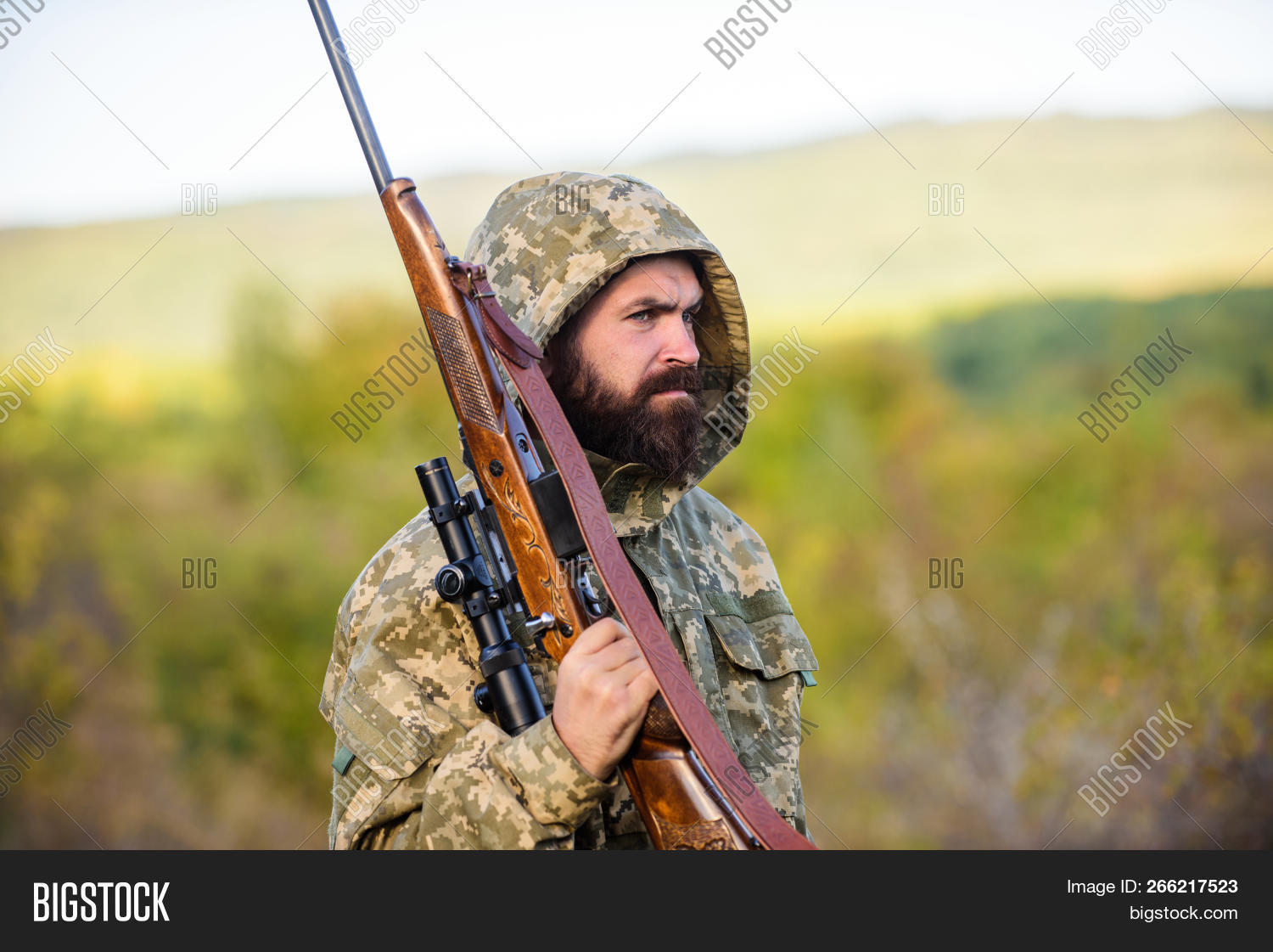 aim,ammunition,animal,background,beard,bearded,big,birds,brutal,carry,club,concept,confident,each,environment,equipment,experience,game,gamekeeper,guide,gun,guy,harvested,hipster,hobby,hunt,hunter,hunting,huntsman,leisure,lends,look,man,masculinity,nature,practice,ranger,require,rifle,season,serious,shoot,sniper,strict,success,tag,target,typically,weapon,woodsman