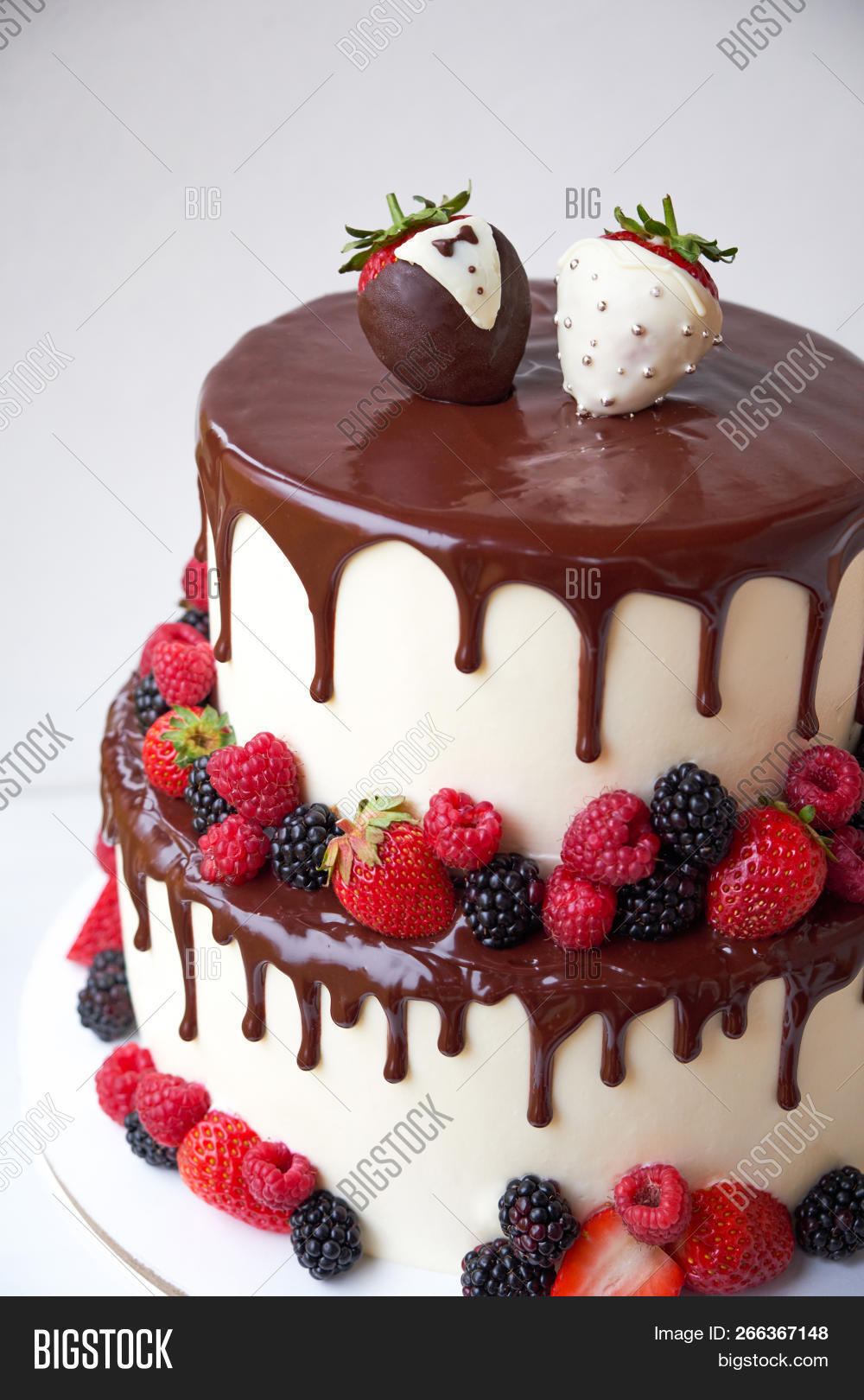 anniversary,background,bakery,beautiful,berries,birthday,blackberry,bow,bridal,bride,cake,card,celebration,ceremony,chocolate,close,cream,decor,dessert,elegance,event,figures,flowing,fresh,fruit,glaze,groom,holiday,invitation,love,marriage,marry,party,pastry,raspberries,red,slices,strawberry,sweet,table,tiered,top,two,view,vintage,wedding,white,wood,wooden