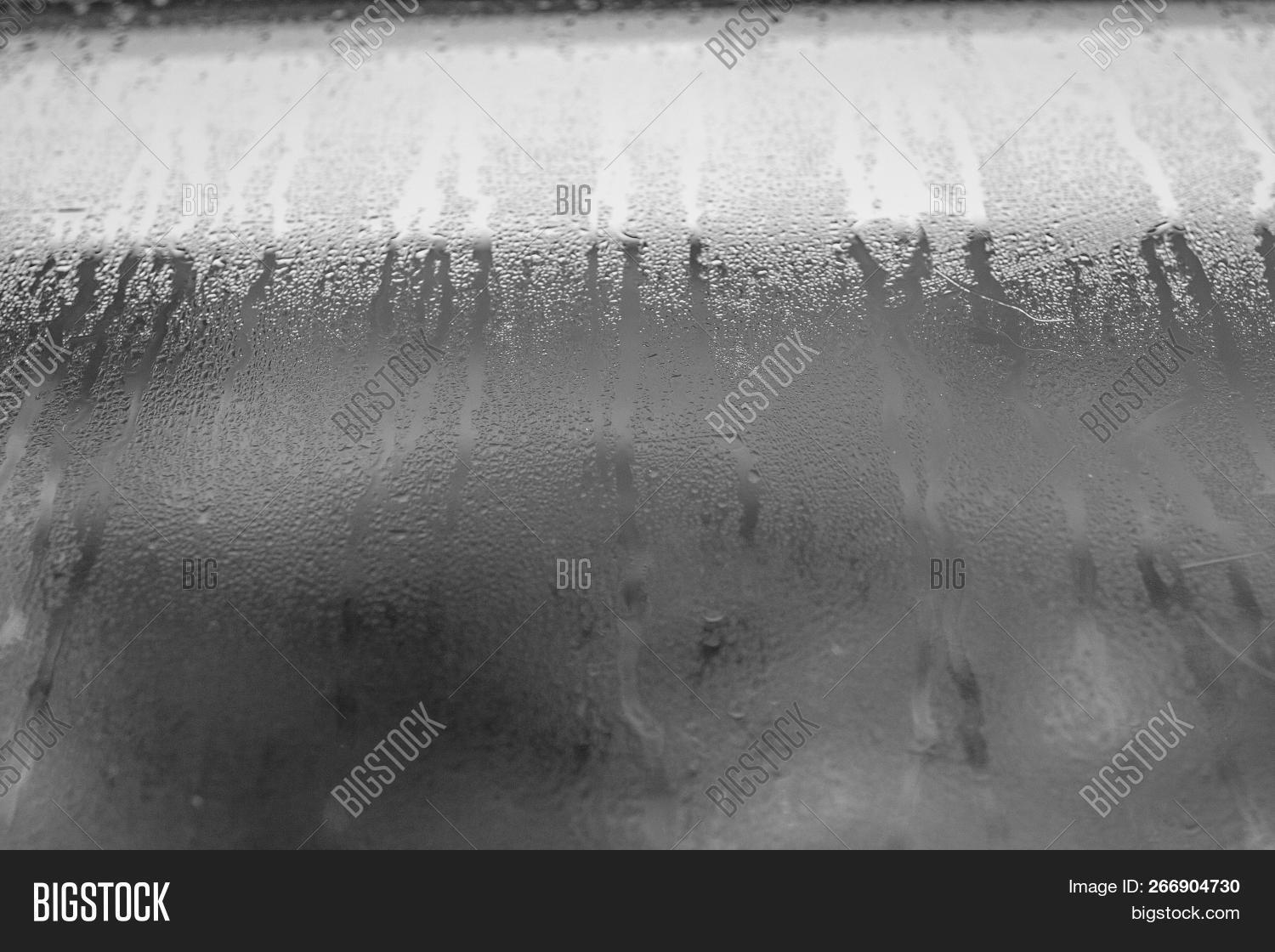 abstract,aqua,autumn,background,black,bright,bubble,clean,clear,closeup,cold,condensate,condensation,dark,design,dew,drips,drop,droplet,environment,fall,flow,glass,glossy,gray,humid,humidity,image,leaking,liquid,macro,moist,moisture,natural,nature,pattern,rain,raindrop,refreshing,ripple,steam,steamy,surface,texture,wallpaper,water,weather,wet,white,window