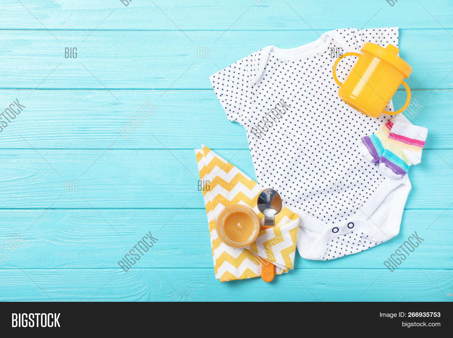 Flat Lay Composition With Stylish Baby Clothes On Wooden