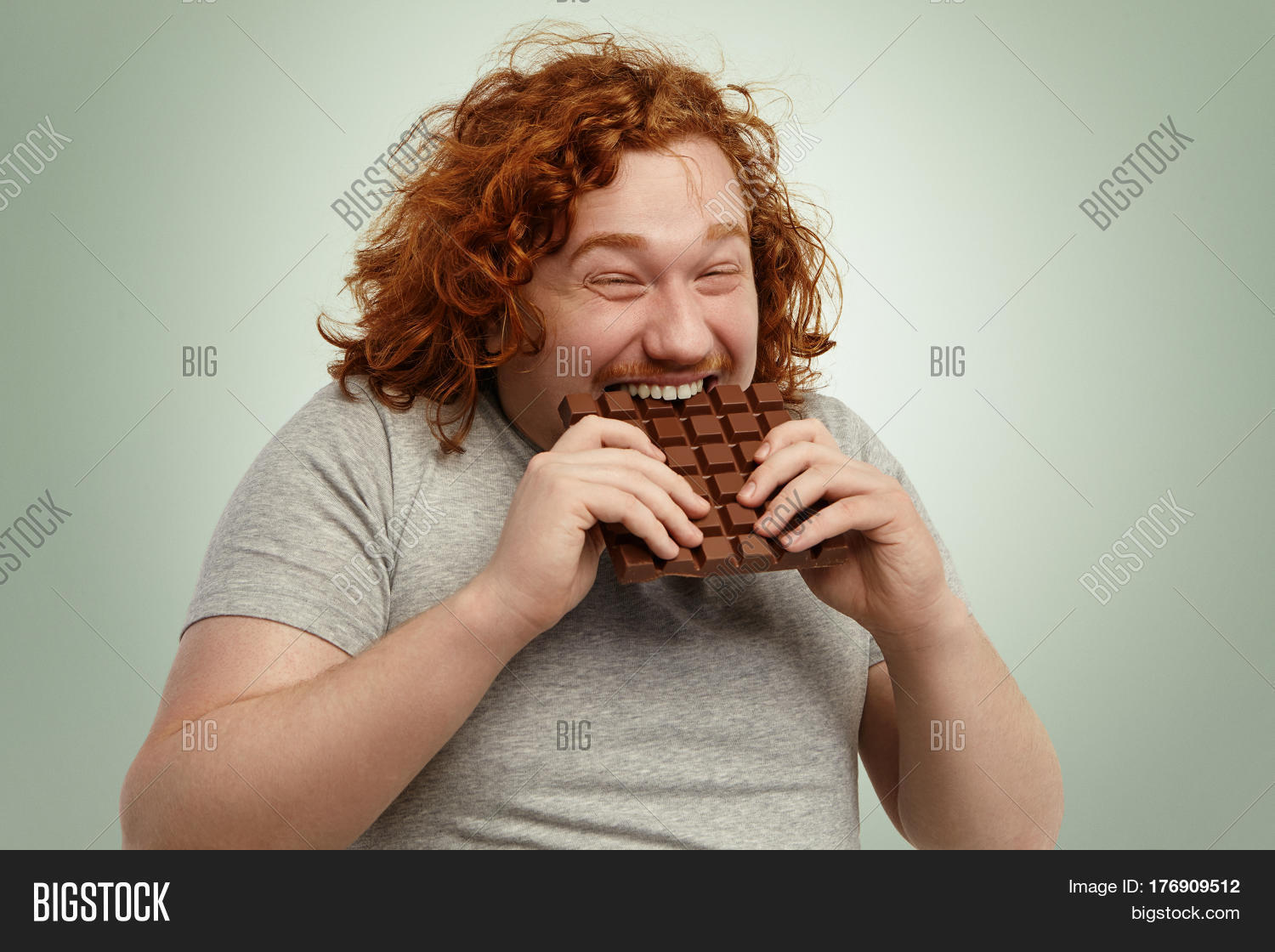 addiction,adult,background,bar,bite,bitter,brown,cake,caucasian,chocolate,confectionery,dark,desert,dessert,diet,eat,face,fat,food,forbidden,fun,funny,good,hand,happy,health,healthy,hold,holding,humor,hungry,interdicted,isolated,male,man,men,mouth,nutrition,overweight,people,prohibited,snack,sugar,sweet,tasting,tasty,temptation,unhealthy,young,yummy
