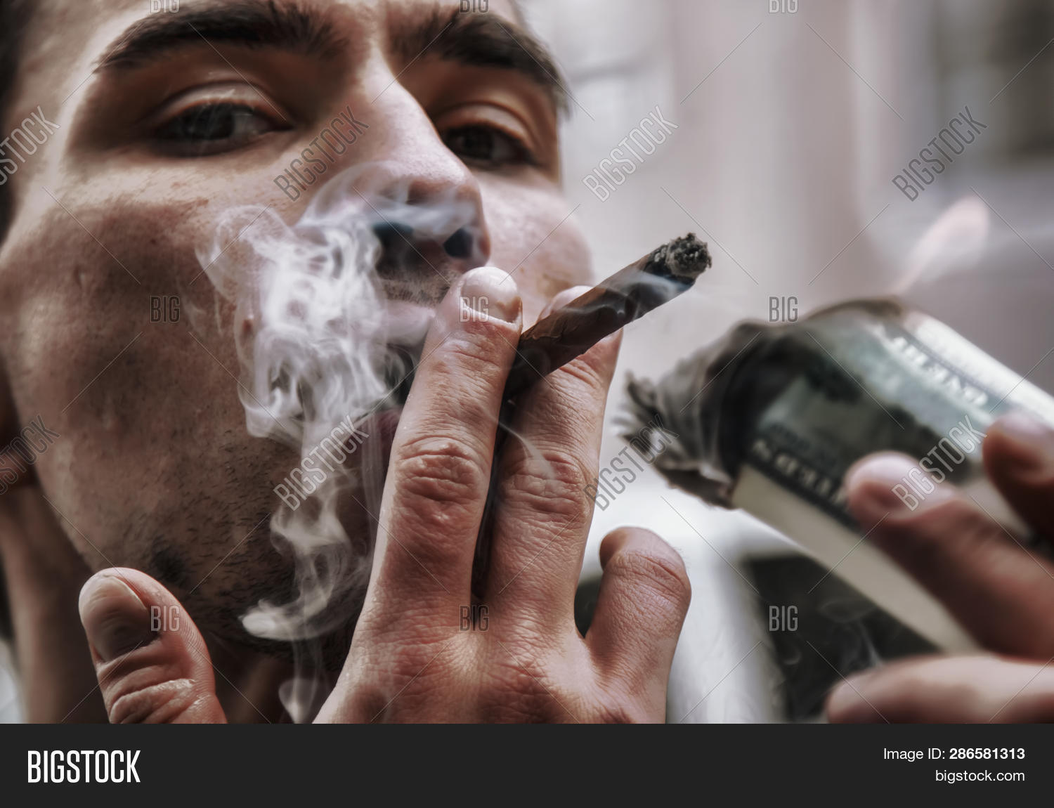 adult,arrogant,bank,banker,banking,banknote,benjamin,bill,boss,business,businessman,businesspeople,cigar,concept,currency,dark,dollar,economy,finance,fire,flame,greed,greedy,indulgence,lighting,luxury,male,man,money,note,one,people,person,rich,smoke,smoker,wealth,young