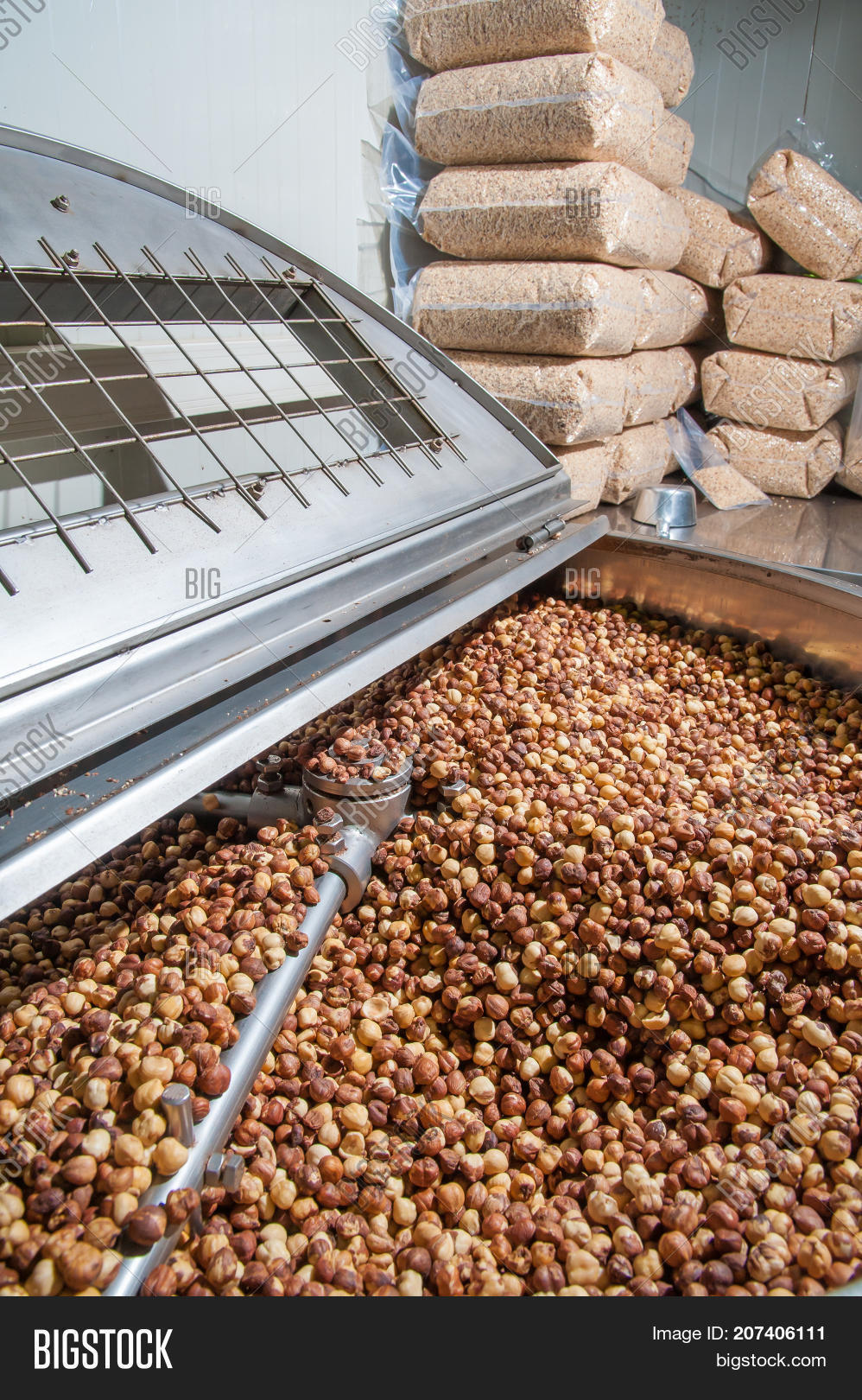 Nebrodi,Sicily,activity,basin,bin,blanching,close-up,closeup,container,cycle,dried,dry,factory,food,fruit,group,hand,hazelnut,heap,industrial,industry,machine,machinery,mechanical,mountain,nut,peeler,peeling,phase,process,processing,product,production,shelled,sicilian,steel,system,tank,tub,work,working