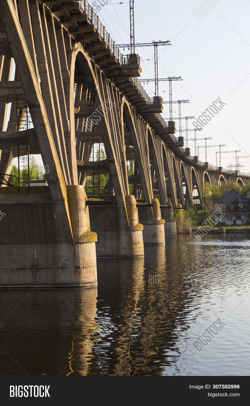 Dnepr,Dnieper,Dnipro,Dnipropetrovsk,Merefa-Kherson,Ukraine,across,ancient,arch,arched,architectural,bridge,bridgework,city,close,close-up,concret,concrete,construction,crossing,engineer,engineering,hight,industrial,industry,infrastructure,monolithic,monument,old,pier,pillar,railway,reinforced,steel,structure,technology,transport,ukrainian,view,water