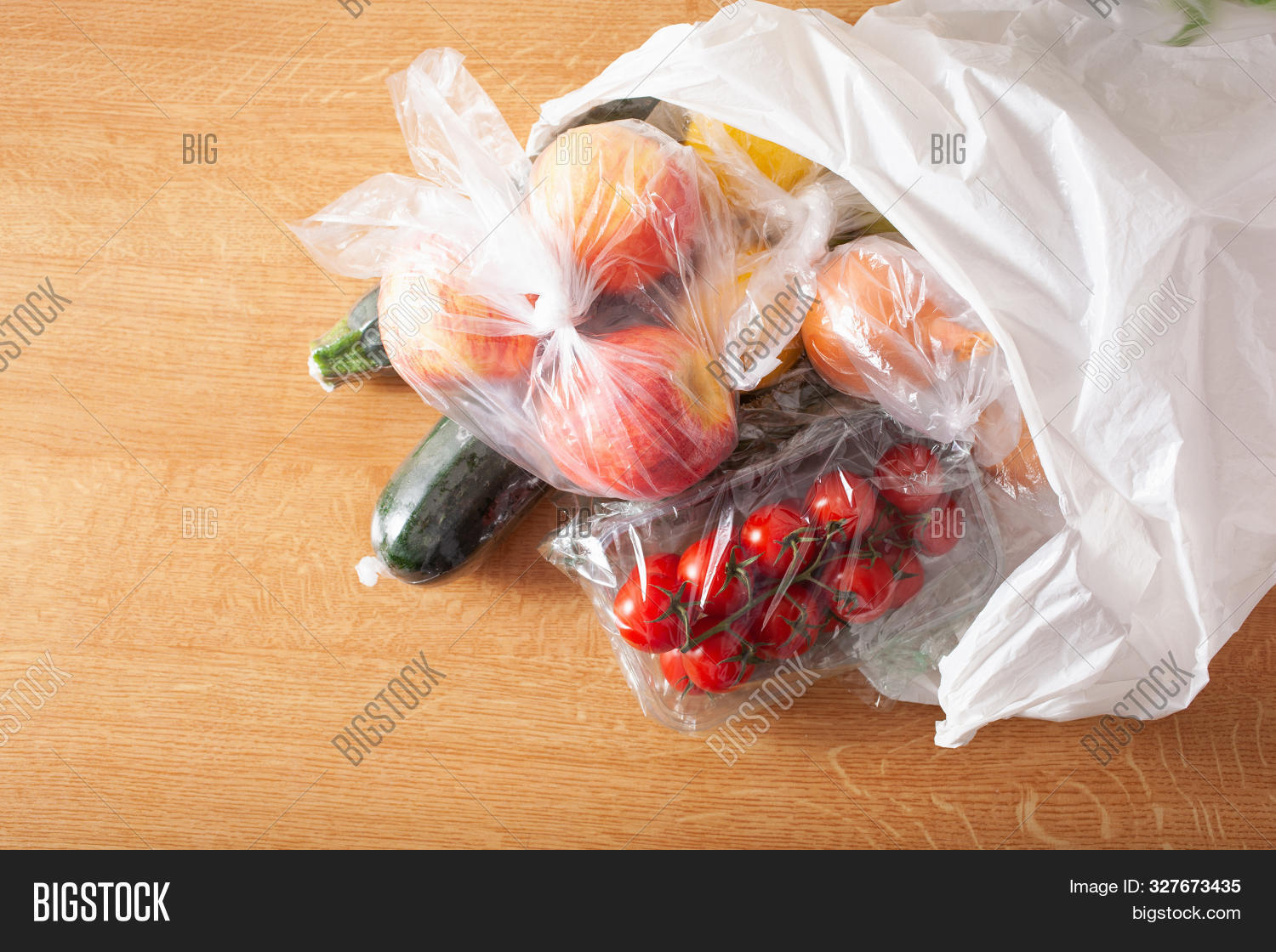 single use plastic waste issue. fruits and vegetables in plastic bags