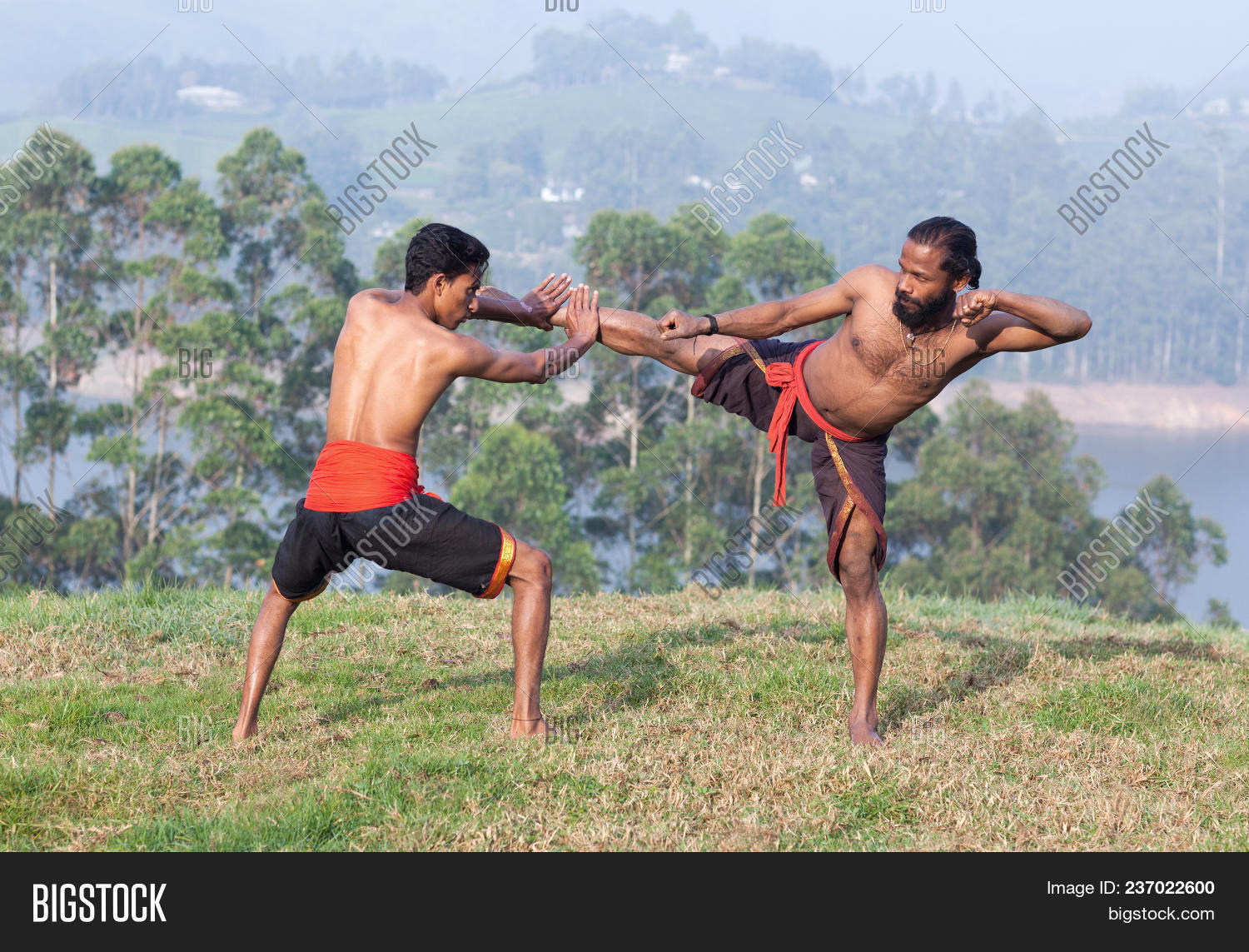 adi,adithada,ancient,art,asana,asia,athlete,body,combat,demonstration,discipline,discovery,fight,fighter,handsome,heritage,incredible,india,indian,kalari,kalaripayatt,kalaripayattu,kalarippayattu,karate,kerala,kick,kickboxing,living,man,martial,master,national,nature,outdoors,performance,position,practice,show,single,skills,south,sport,strong,thada,tradition,traditional,training,warrior,yoga,young