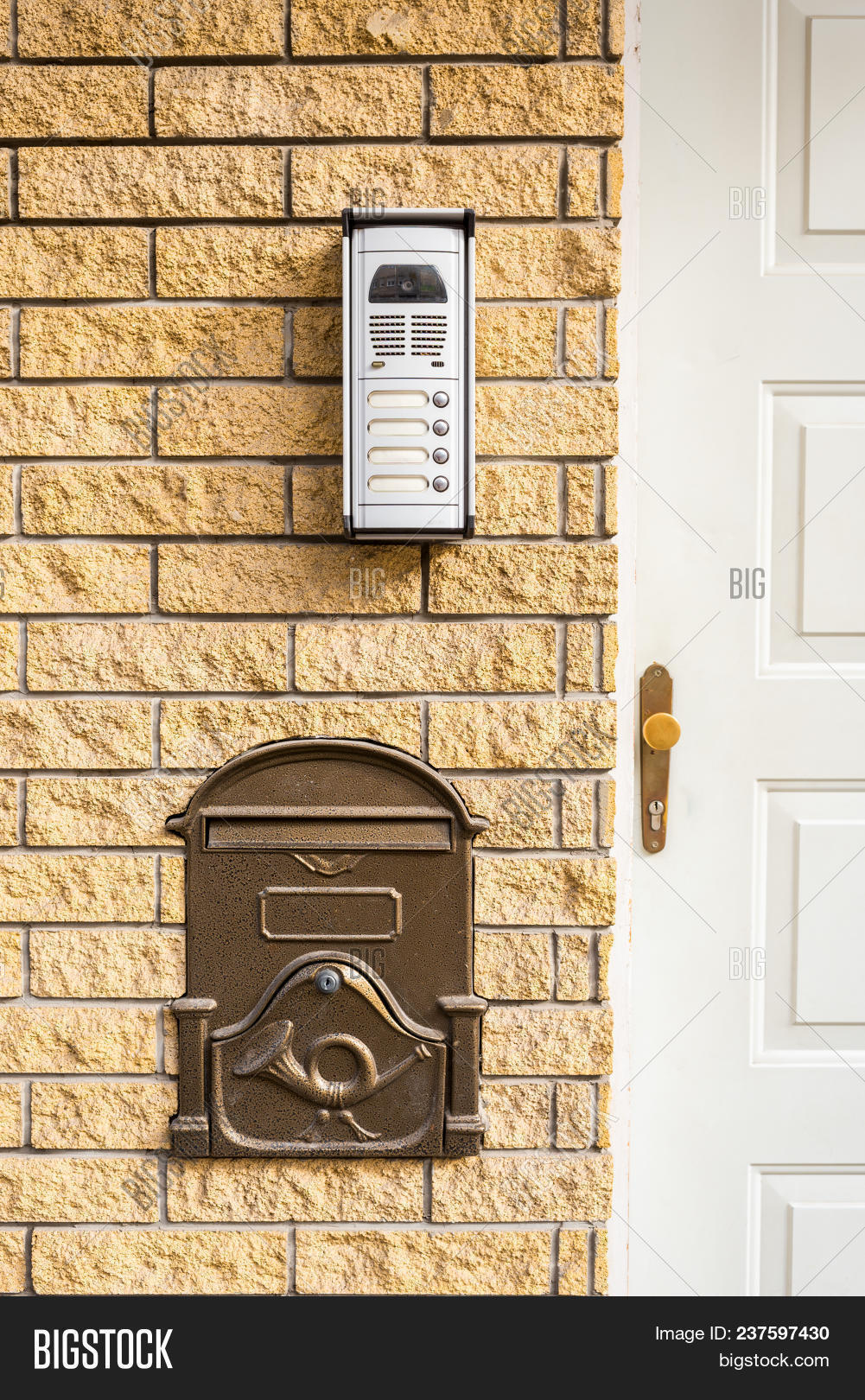 Intercom And Mailbox Built In Brick Wall At The Door Of Access
