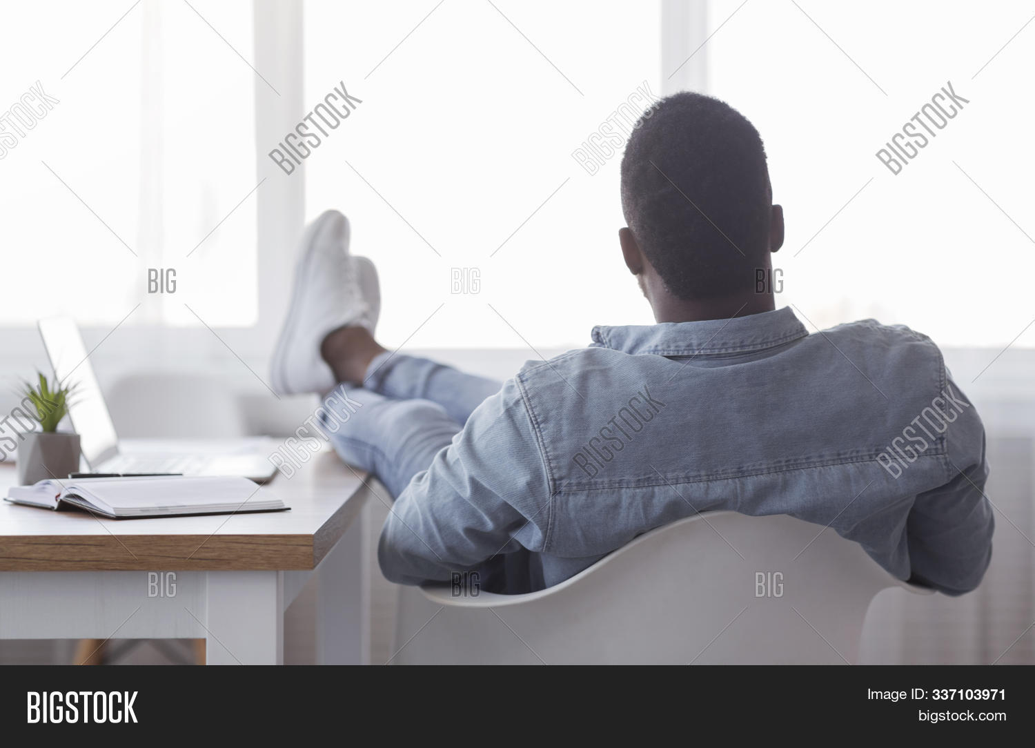 adult,back,black,bored,boss,break,business,businessman,careless,casual,comfortable,desk,dreaming,employee,idle,idleness,inefficient,job,laziness,lazy,legs,loafer,looking,lounging,male,man,manager,millennial,office,people,person,relax,rest,resting,spending,table,thinking,time,tired,useless,view,window,work,worker,workplace