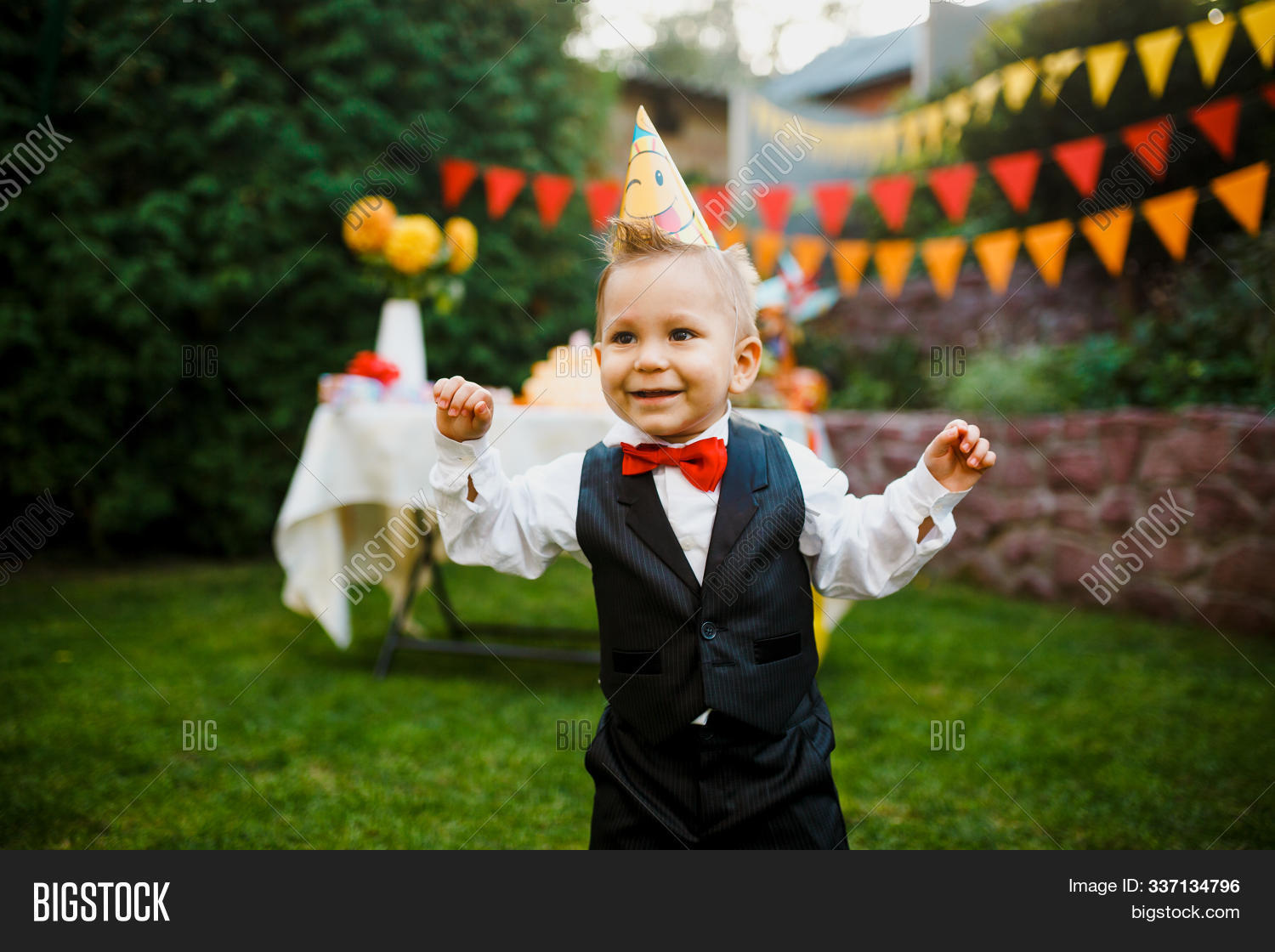 baby,background,backyard,beautiful,birthday,boy,cake,caucasian,celebration,child,childhood,colorful,concept,cone,cute,day,decor,enjoyment,feast,festive,fun,garden,grass,happiness,happy,healthy,holiday,infant,kid,lawn,lifestyle,outdoor,outside,park,party,person,portrait,smile,sweet,table,tuxedo,yard,young