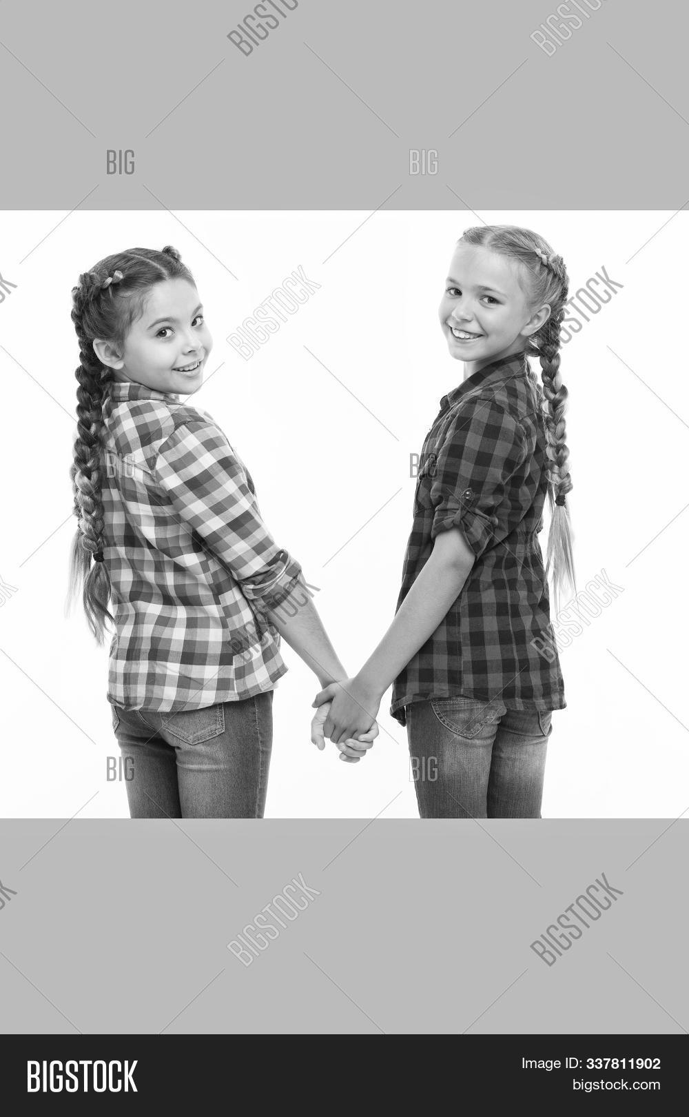 adorable,babies,beautiful,beauty,bonding,bonds,braids,casual,cheerful,childhood,children,cute,emotions,enjoy,enjoying,family,fashion,fashionable,fellows,friends,friendship,fun,game,girls,hair,hairstyle,hands,happiness,happy,hold,kids,little,long,mates,plaited,plaits,play,relations,relationship,sisters,small,smile,smiling,style,stylish