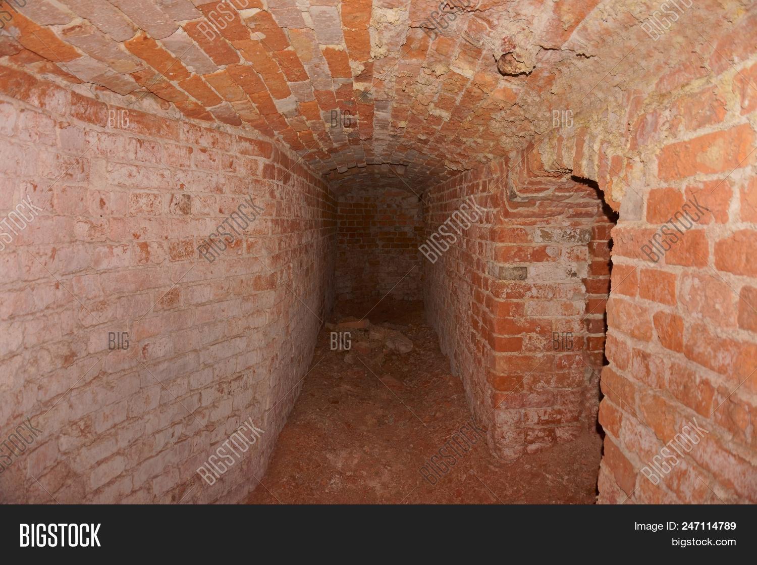 abandoned,ancient,arch,architecture,background,basement,brick,building,built,castle,corridor,creepy,dark,deadlock,dungeon,entrance,floor,fortress,history,horror,light,medieval,mystery,old,passage,perspective,ruined,spooky,stone,structure,tunnel,underground,vault,wall,way