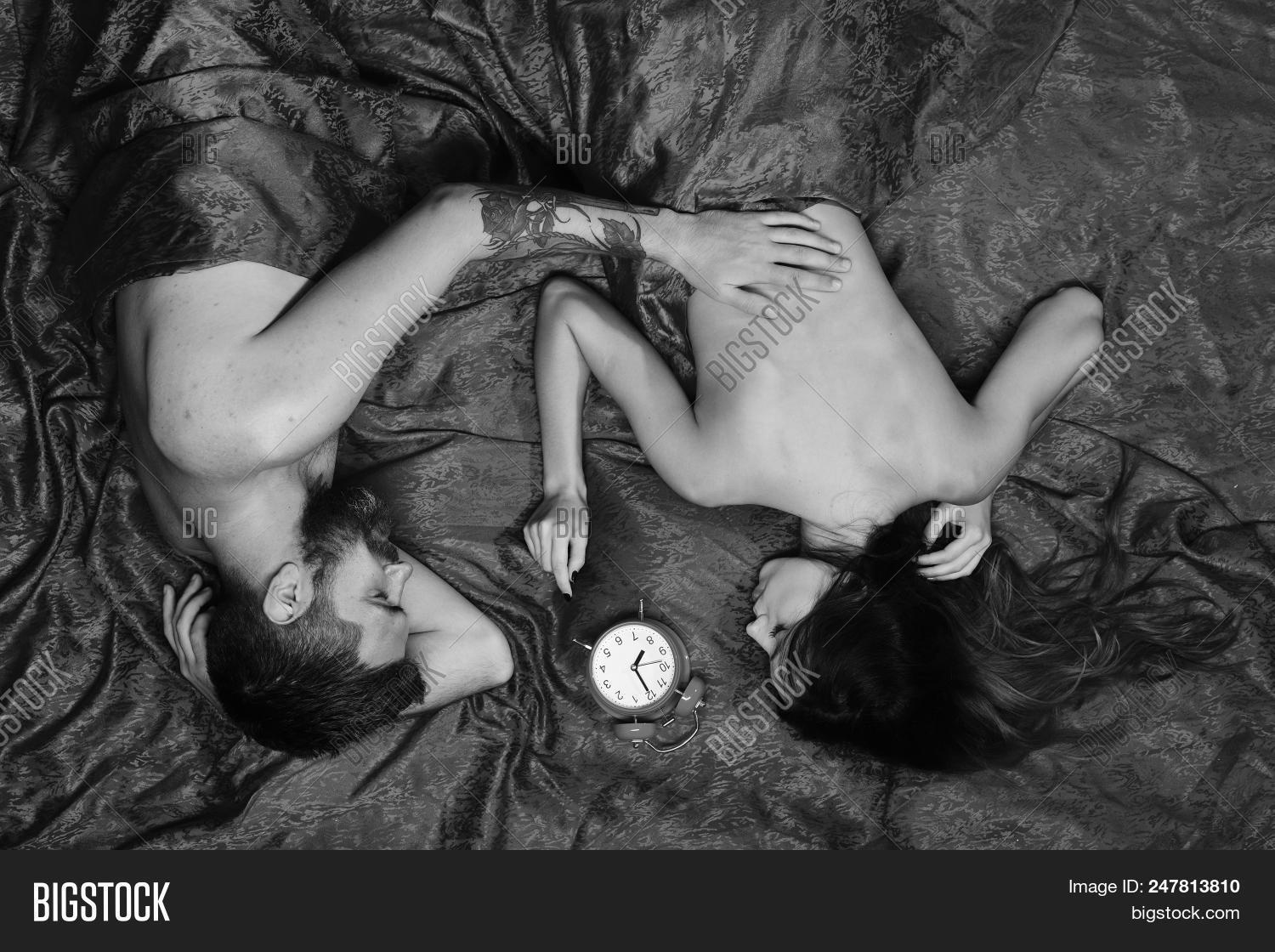 adult,alarm,back,barbershop,beard,bearded,bed,body,breakfast,caucasian,clock,concept,couple,covered,guy,hair,hairdo,hairdresser,half,in,lady,lie,love,macho,male,man,morning,muscles,muscular,perfect,pleasure,pretty,red,romance,romantic,sex,sexy,sheet,tattoo,top,topview,touch,unshaven,view,woman