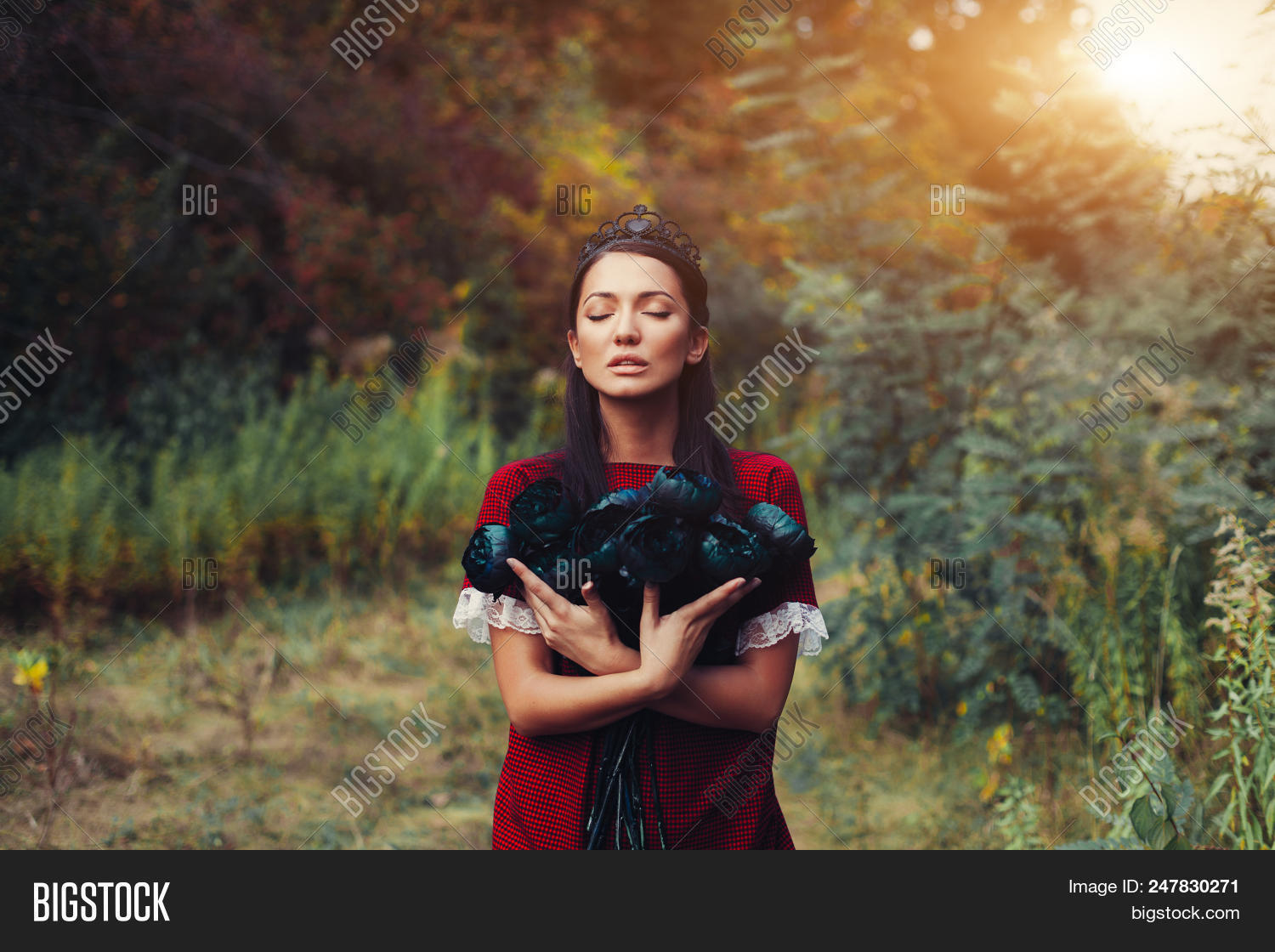 A Beautiful Dark Haired Princess In A Black Crown Hugs Dead
