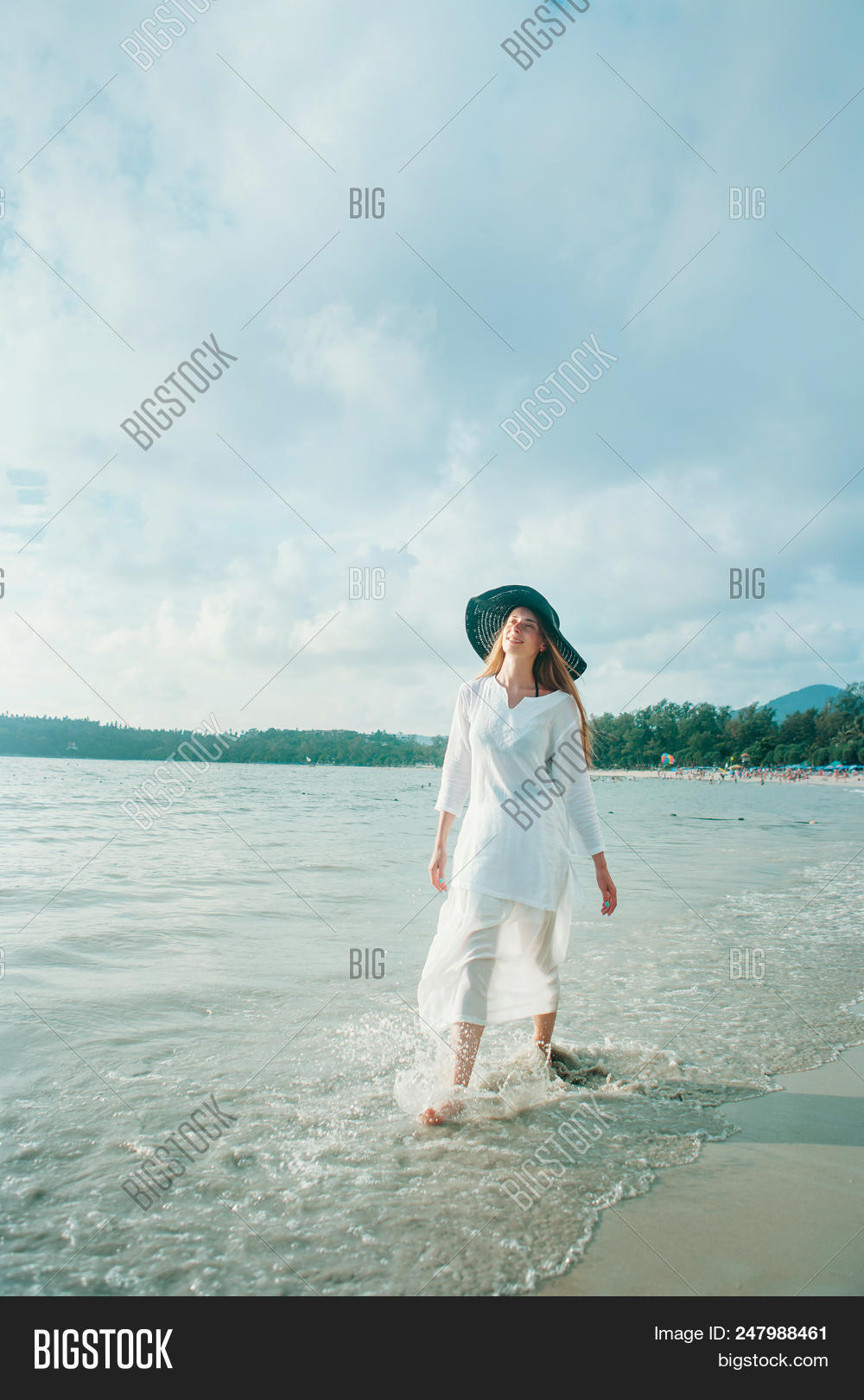 Handsome Girl In Hat On The Beach Background. Portrait Of A Woman In ...