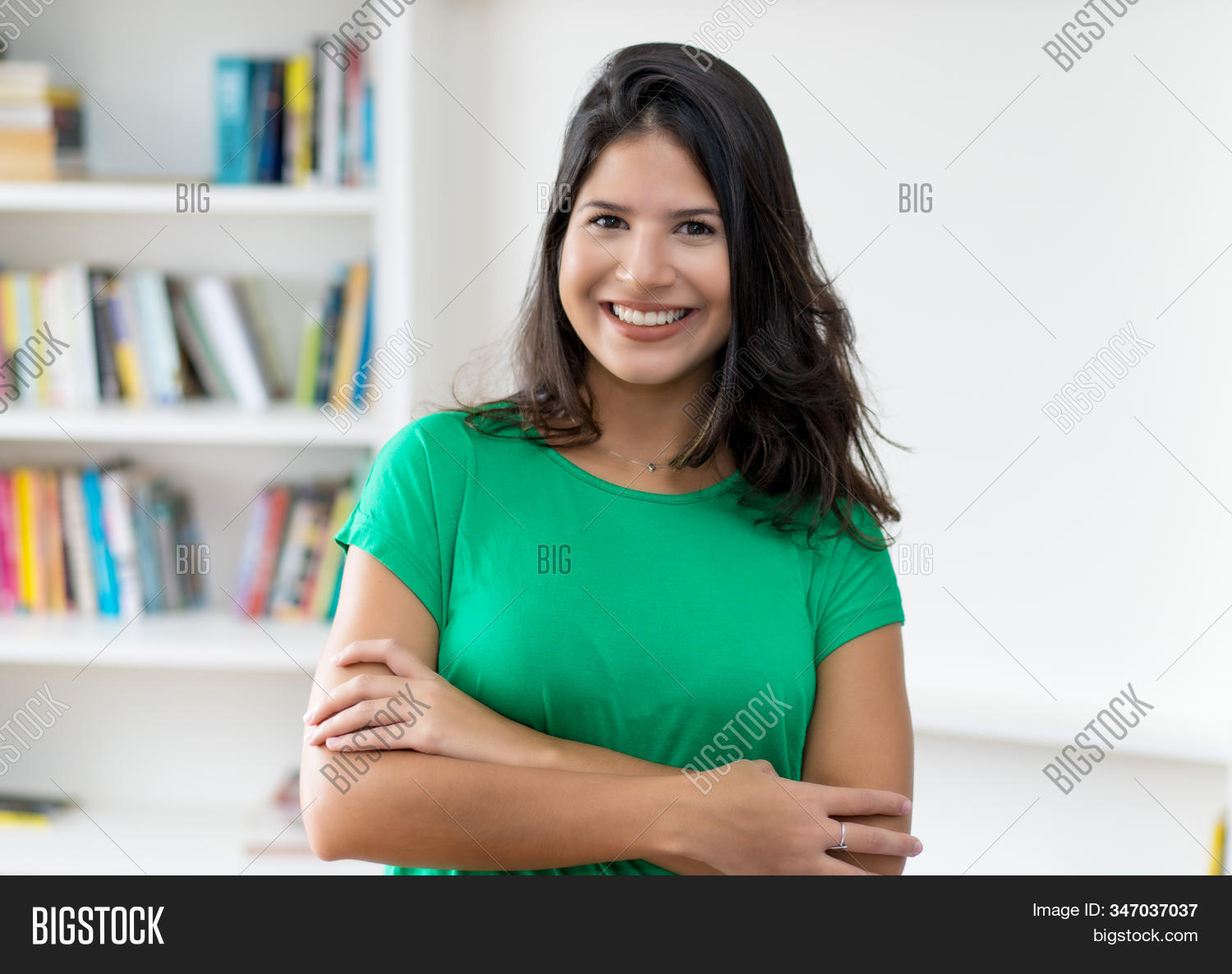woman,young,adult,latin,hispanic,girl,laughing,beautiful,pretty,smiling,brazilian,happy,face,looking,at,camera,people,person,smile,enjoying,leisure,pleasure,single,female,student,beauty,generation,y,portrait,american,south,lifestyle,colombian,20s,casual,mexican,america,immigrant,excited,caucasian,long,hair,dark,italian,indoor,home,posing,natural,green,shirt
