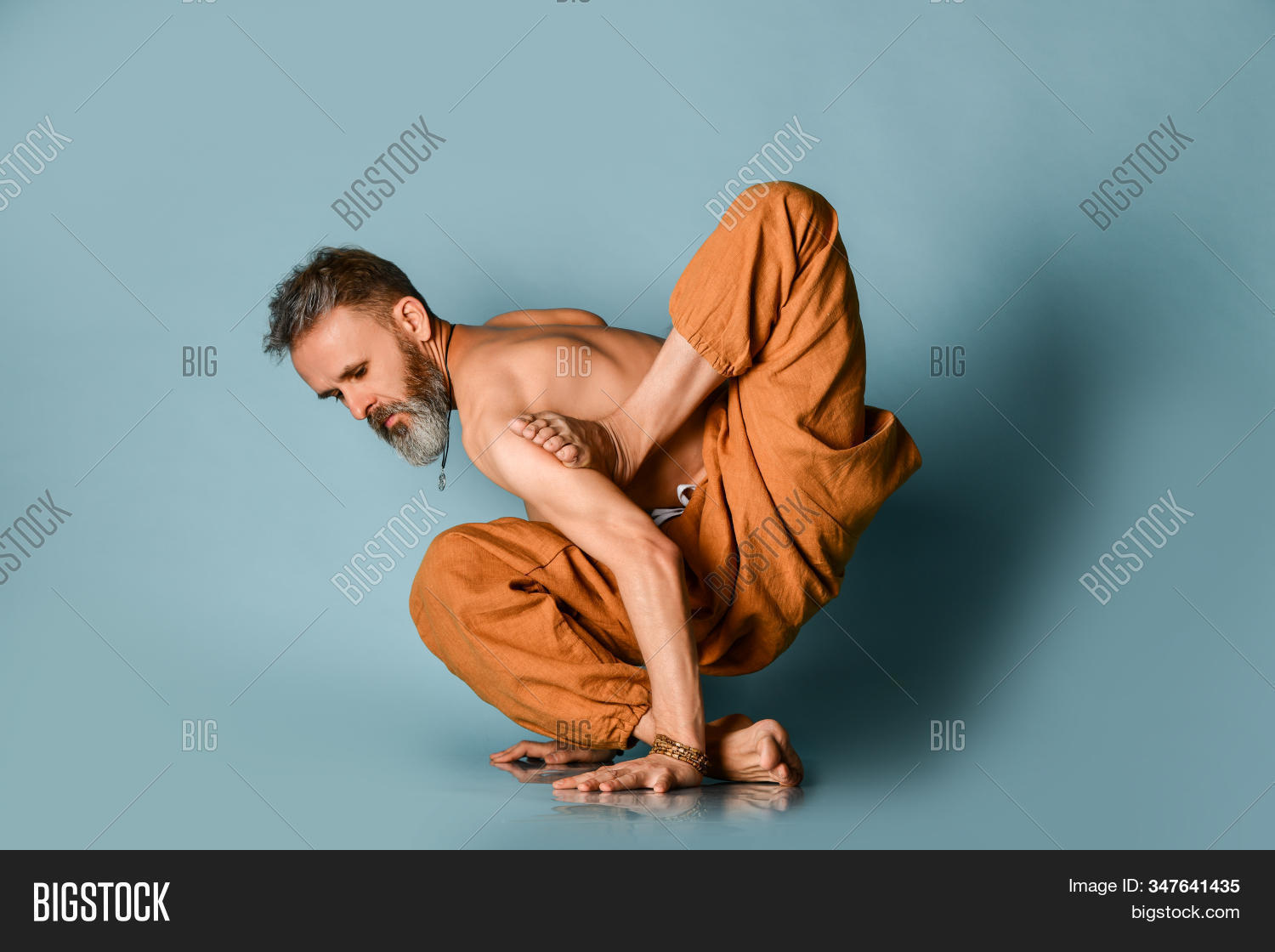 yoga,man,pose,flexibility,studio,exercise,health,male,old,training,asana,fitness,athletic,body,person,strength,sport,background,gymnastics,adult,concentration,meditation,stretch,gym,professional,wellbeing,workout,active,balance,wellness,healthy,relaxation,zen,activity,fit,flexible,muscular,indoor,people,practice,one,skill,stretching,lifestyle,action,pilates,flex,figure,guru,human