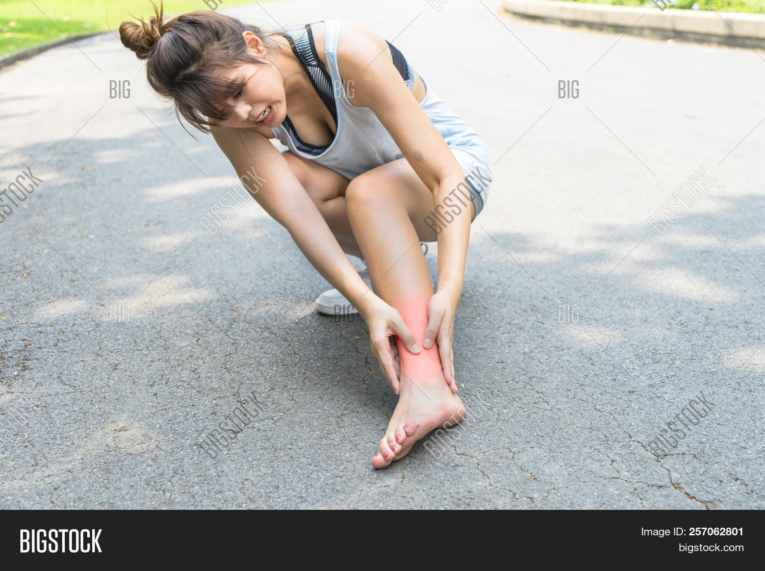 accident,ache,ankle,athlete,body,caucasian,exercise,feet,female,fitness,foot,health,healthy,holding,hurt,injured,injury,jogger,jogging,joint,knee,leg,ligament,massage,medical,medicine,muscle,muscular,outdoor,pain,painful,people,person,physical,problem,recovery,red,run,shoe,sore,soreness,sport,sprain,strain,support,tendon,therapeutic,training,woman,workout