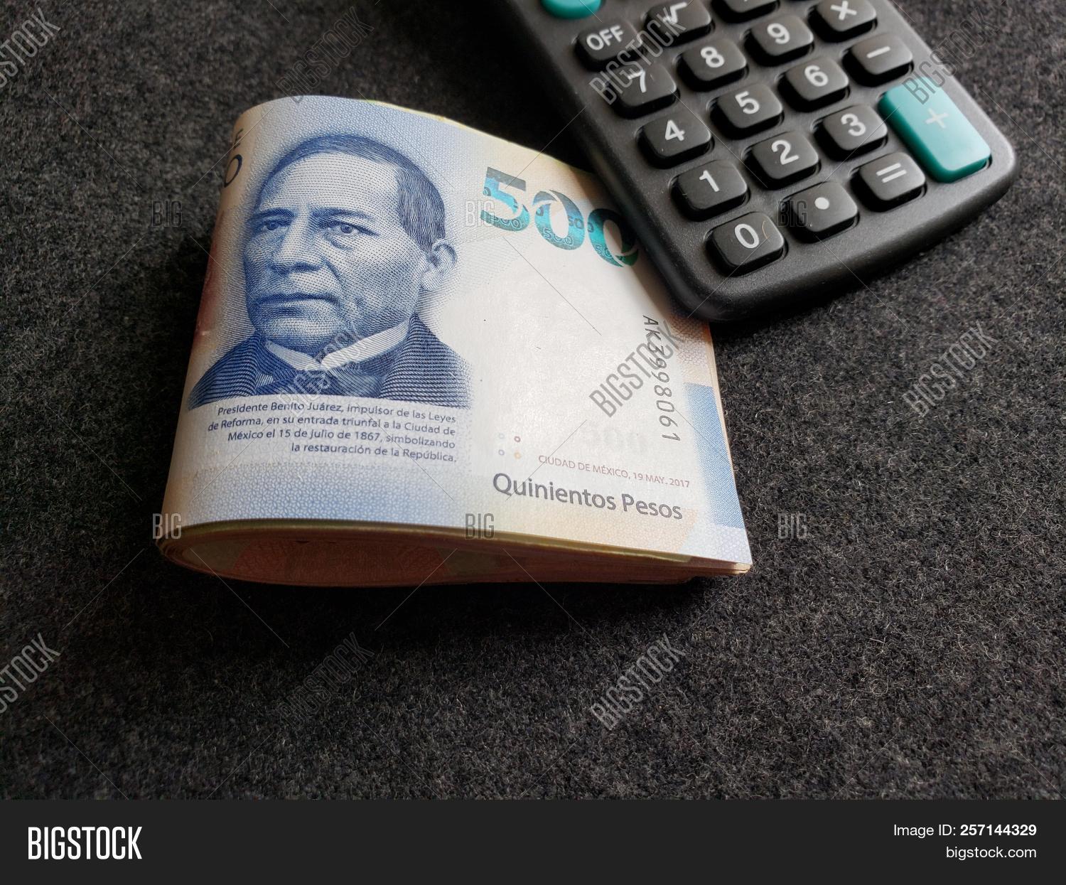 Background With Mexican Banknote Of 500 Pesos And Calculator Mexican Banknote Of 500 Pesos