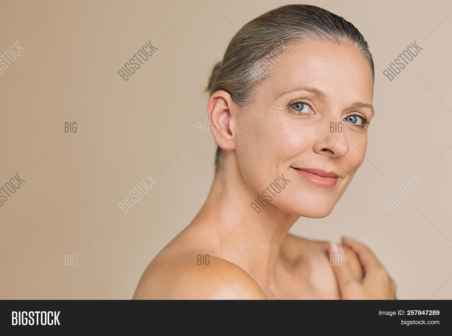 40s woman,50s woman,aged,aging,aging process,aging skin,anti aging,anti-aging,attractive,background,beautiful,beauty,beauty treatment,beauty woman,body care,bodycare,care,complexion,copy space,cosmetology,elderly,elegant,face,gray,happy,health,healthy,isolated,looking,looking at camera,mature,matured,mid,middle,middle aged woman,older,pleasant,portrait,process,senior,skin,skin care,skincare,smiling,spa,studio,wrinkle,wrinkle free,wrinkled face,wrinkles
