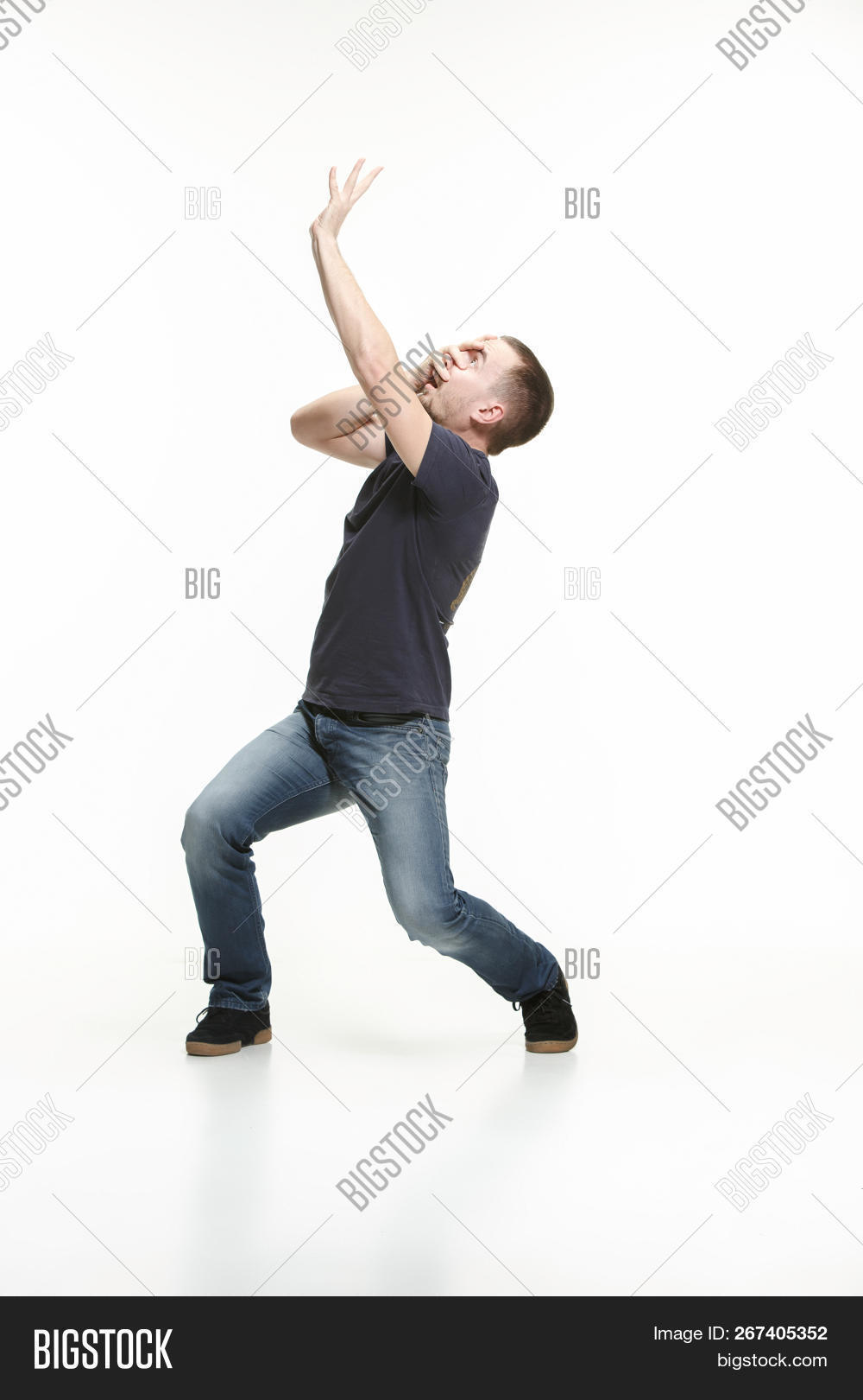 30s,adult,afraid,aghast,anxiety,attractive,body,boy,casual,contemporary,cool,covering,expression,face,fashion,fear,fight,fresh,fright,frightened,full,fullbody,guy,handsome,hiding,isolated,jeans,male,man,model,modern,nervous,one,panic,people,person,portrait,scared,scream,single,standing,stress,student,studio,style,stylish,surprise,white,whole,young