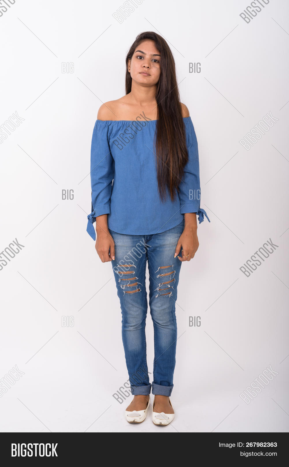 20s,adult,background,beautiful,body,female,full,girl,indian,lady,length,looking,one,people,person,portrait,shot,shoulders,single,standing,studio,vertical,white,woman,young