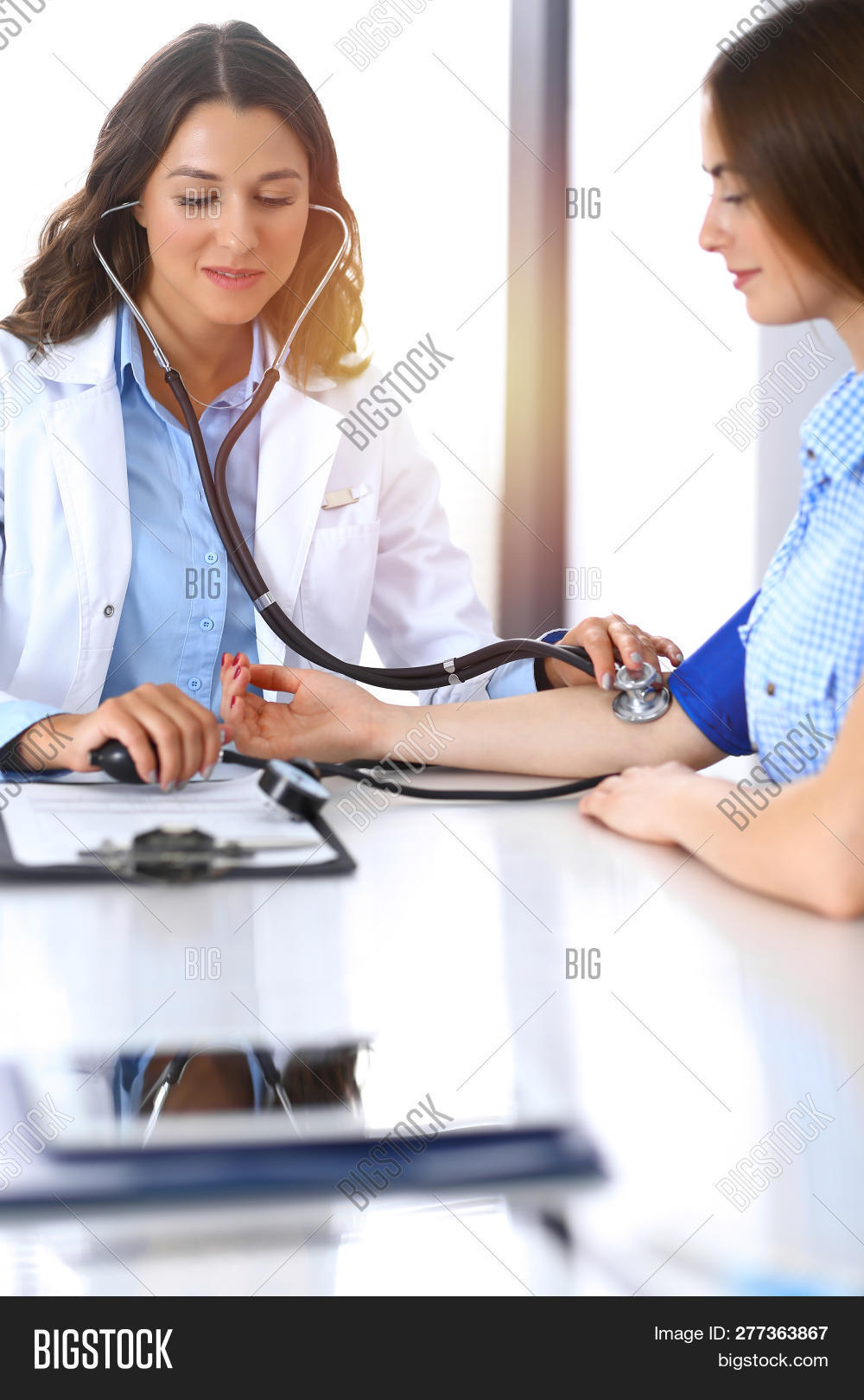 analysis,arm,arterial,blood,cardiologist,cardiology,care,check,clinic,consultation,control,copy-space,desk,device,diagnosis,diagnostic,doctor,ductor,examination,examine,female,general,hands,health,healthcare,hospital,hypertantion,measuring,medical,medicin,medicine,patient,pharmacy,practice,practitioner,pressure,prevention,pulse,sitting,stethoscope,test,therapist,treatment,unknown,woman,working