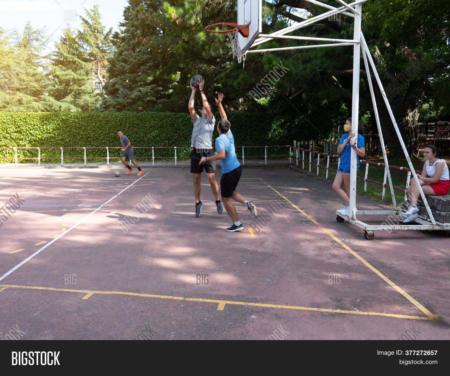 guy, 																					person, 																					ball, 																					boy, 																					sport, 																					basketball, 																					action, 																					athlete, 																					exercise, 																					playing, 																					training, 																					male, 																					competition, 																					court, 																					fitness, 																					player, 																					game, 																					match, 																					energy, 																					jump, 																					play, 																					score, 																					team, 																					defending, 																					sunlight, 																					alone, 																					friendship, 																					group, 																					muscular, 																					serious, 																					skill, 																					standing, 																					strong, 																					youth, 																					high, 																					hoop, 																					motion, 																					playground, 																					sportsman, 																					agility, 																					athletic, 																					attack, 																					college, 																					fresh, 																					air, 																					basket, 																					shooting, 																					defend, 																					blocking, 																					stopper