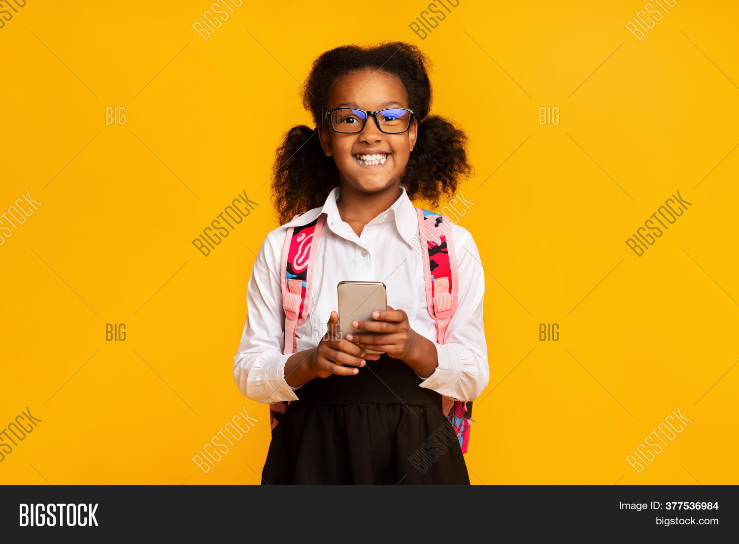 schoolgirl, 																					girl, 																					cellphone, 																					school, 																					gadget, 																					addiction, 																					grade, 																					internet, 																					happy, 																					afro, 																					childhood, 																					homework, 																					sms, 																					phone, 																					little, 																					black, 																					e-learning, 																					people, 																					elementary, 																					application, 																					using, 																					pupil, 																					background, 																					ad, 																					classes, 																					child, 																					study, 																					pre-teen, 																					smartphone, 																					education, 																					kid, 																					backpack, 																					app, 																					lesson, 																					yellow, 																					studio, 																					smiling, 																					technology, 																					concept, 																					banner, 																					online, 																					knowledge, 																					mobile, 																					posing, 																					leisure, 																					play, 																					game