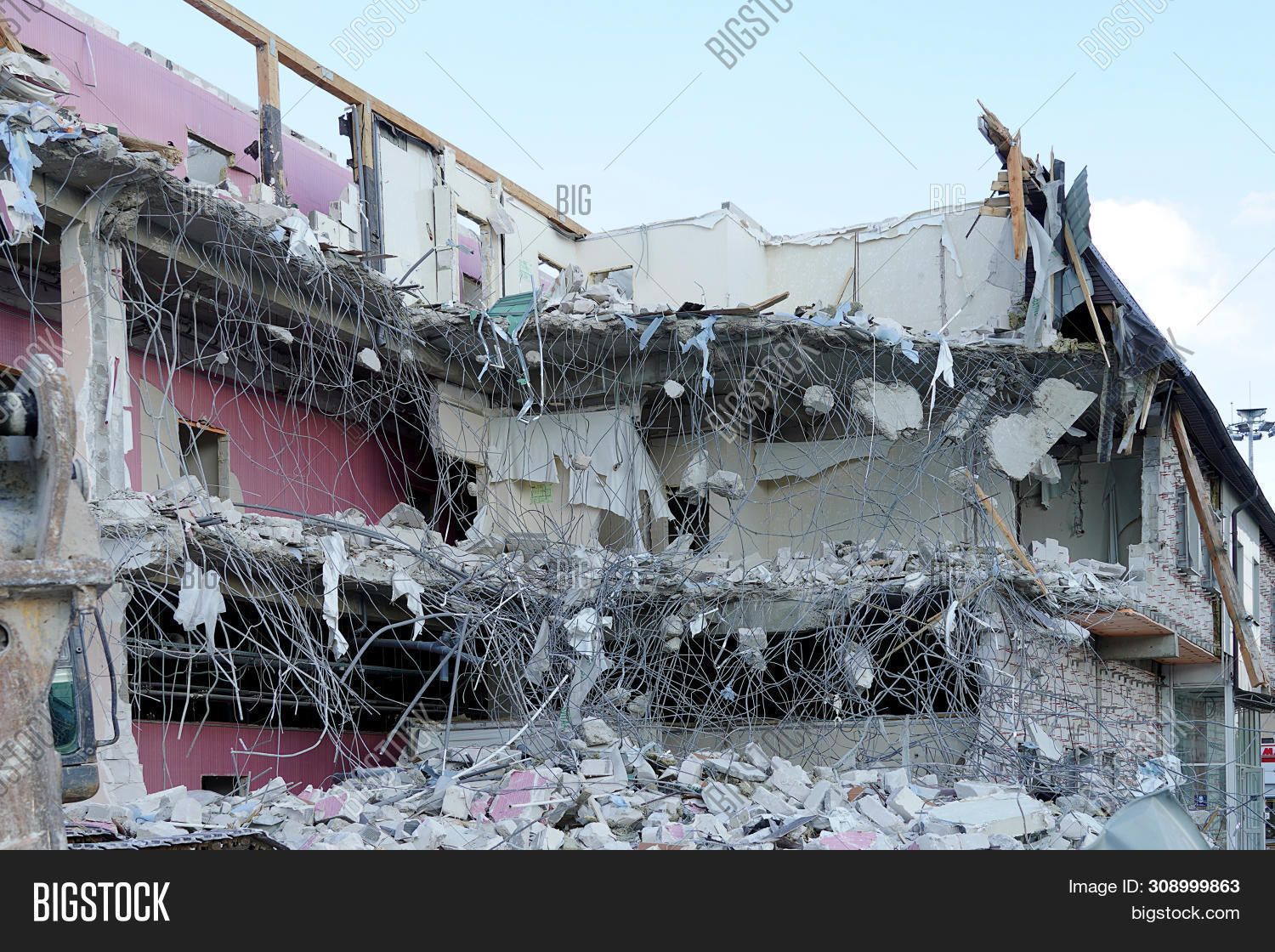 Destroyed Apartment House. Lying Armature, Concrete, Broken Floors And