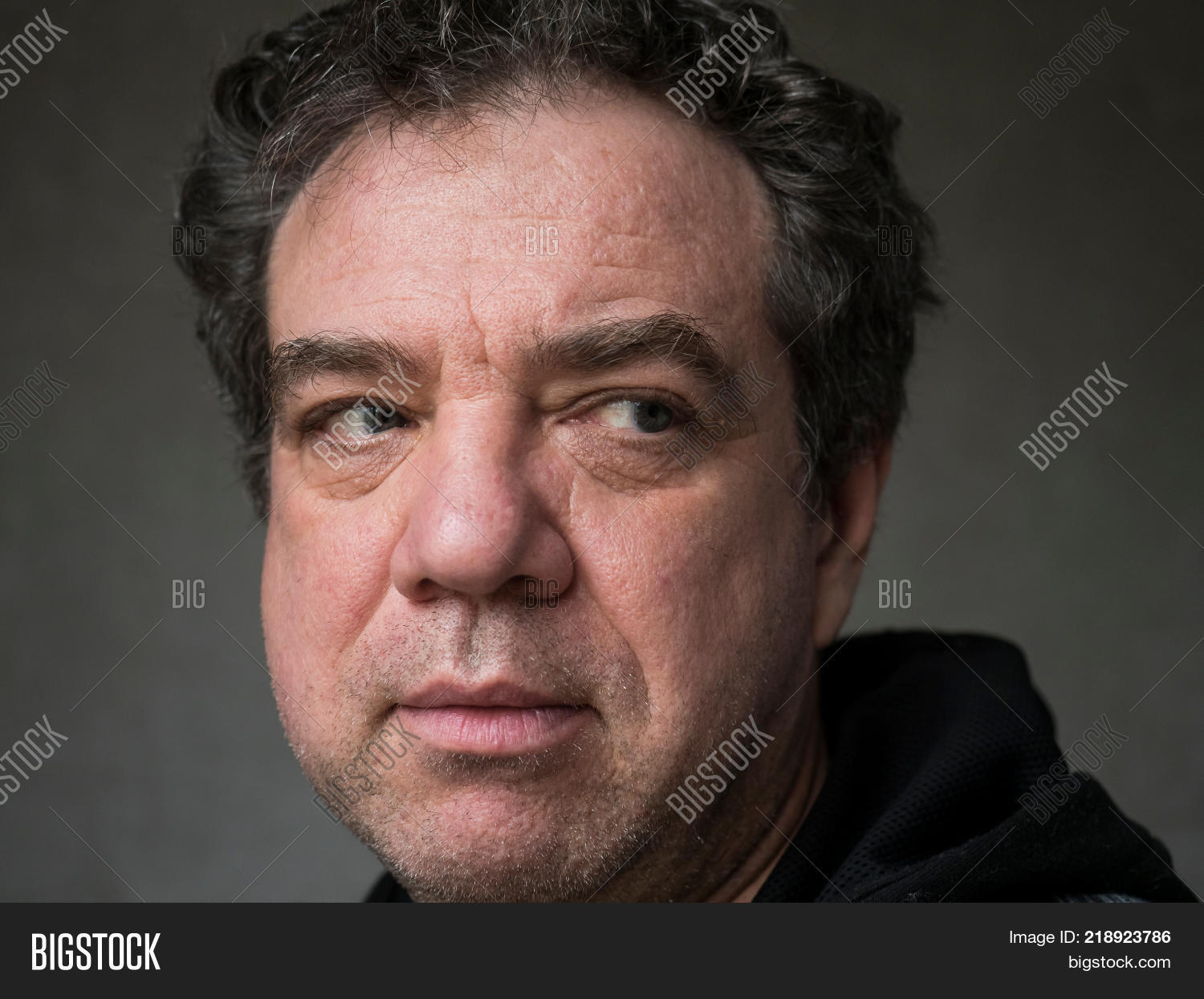 adult,attractive,black,caucasian,cheerful,close,closeup,color,colour,copy,delight,enjoyment,expression,face,fellow,fifties,fifty,forties,forty,front,gaiety,gentleman,glad,gleeful,happy,head,horizontal,human,image,indoors,looking,male,man,mature,men,mid,one,only,people,person,photography,portrait,posing,senior,serious,shoulders,smiling,space,up,view