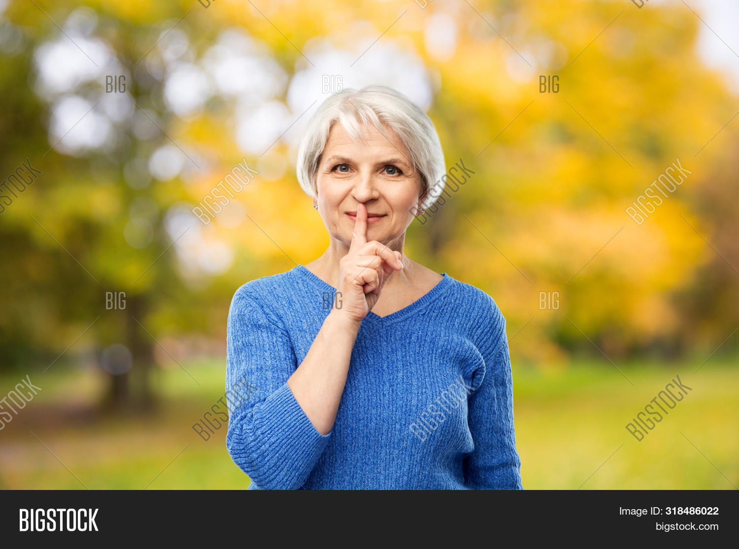 60s,adorable,adult,age,aged,aging,autumn,background,beautiful,blue,censored,concept,confidentiality,eld,elder,elderly,fall,female,gesture,grandma,grandmother,hand,happy,hush,lady,lovely,mature,mute,nice,old,older,park,person,portrait,pullover,quiet,retired,retirement,season,secret,senior,shhh,short hair,shush,silence,smiling,sweater,warning,woman