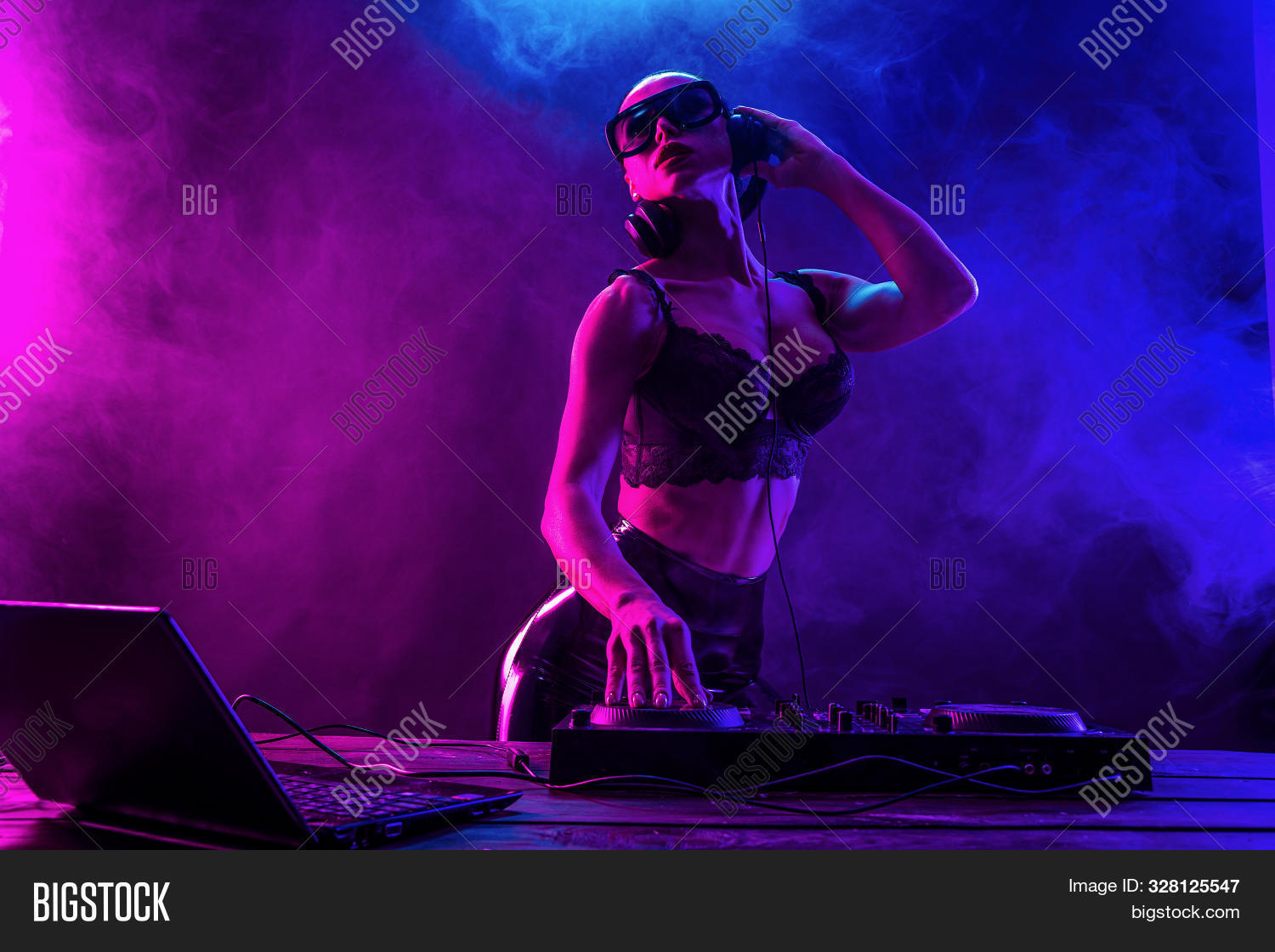 20s,attractive,audio,beautiful,beauty,black,blue,breast,caucasian,club,clubbing,contrast,dance,dancer,dj,earphones,electronics,energy,entertainment,equipment,european,fashion,female,flare,girl,glasses,go-go,hair,headphones,instrument,light,loudspeaker,mixing,modern,music,night,nightclub,party,people,portrait,pretty,red,sensuality,sexy,smoke,sound,table,vibrant,woman,young