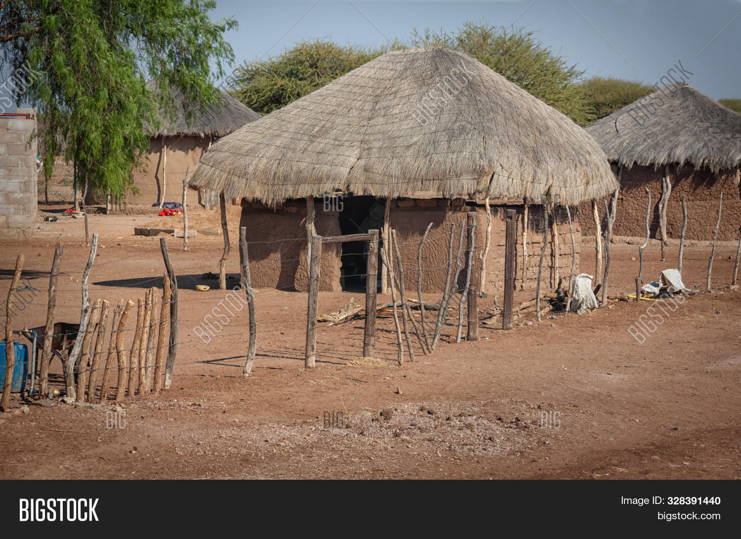 africa,african,architecture,botswana,bricks,dry,fence,gate,kitchen,landscape,locked,low income,mud,old,outdoors,outside,poor,poverty,proteins,region,road,roof,rural,scarcity,shack,south africa,southern africa,summer,thatched,third world,traditional,tree,village,vintage,walls,yard