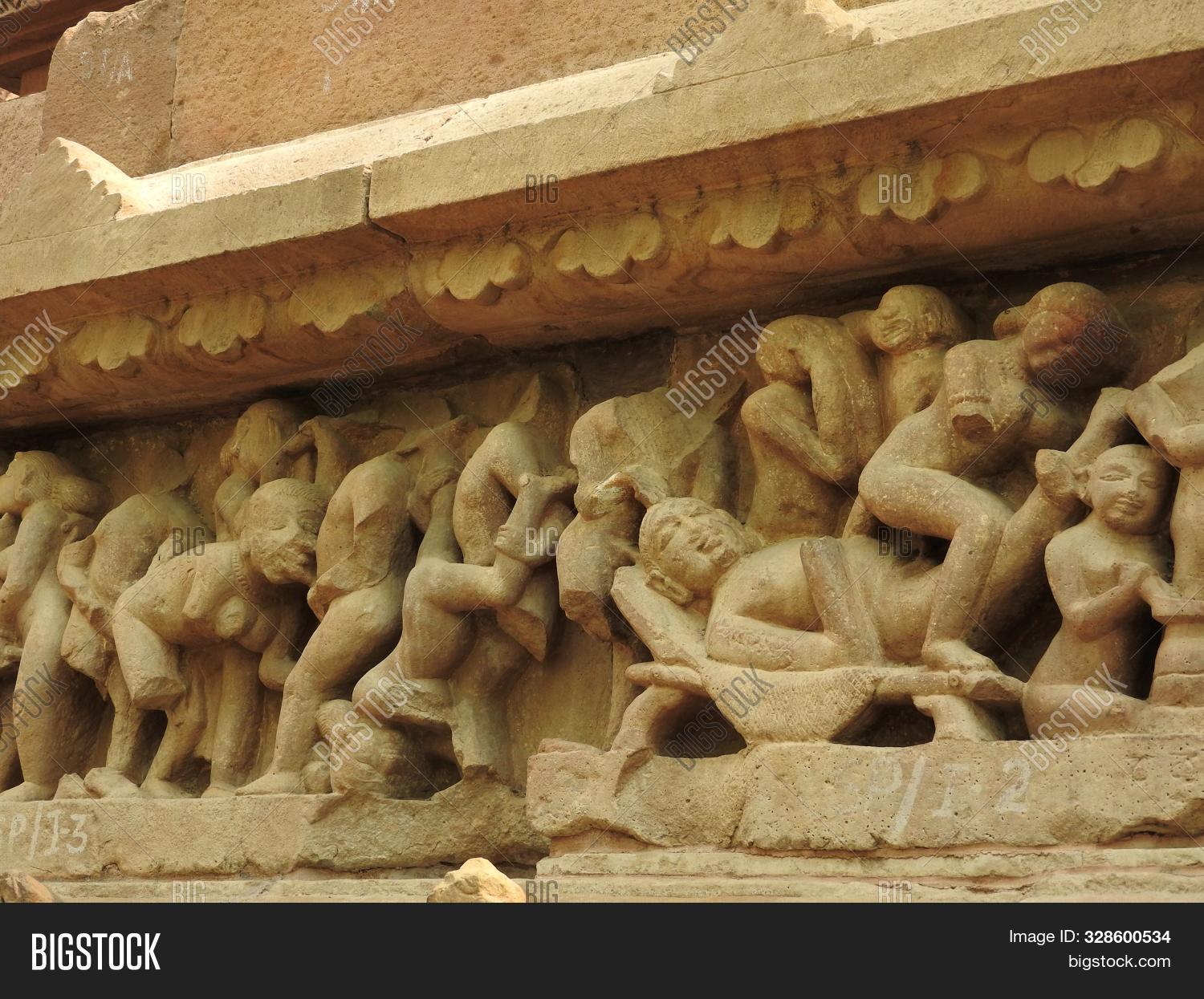 ancient,antique,architectural,architecture,art,asia,asian,building,carved,chandelas,chitragupta,culture,eastern,erotic,exterior,famous,goddesses,heritage,hindu,hinduism,historic,historical,history,india,indian,kamasutra,khajuraho,landmark,madhya,mahadeva,monument,nude,old,ornate,pradesh,religion,religious,sculpture,sex,shrine,site,statue,stone,temple,tourism,tourist,travel,unesco,world