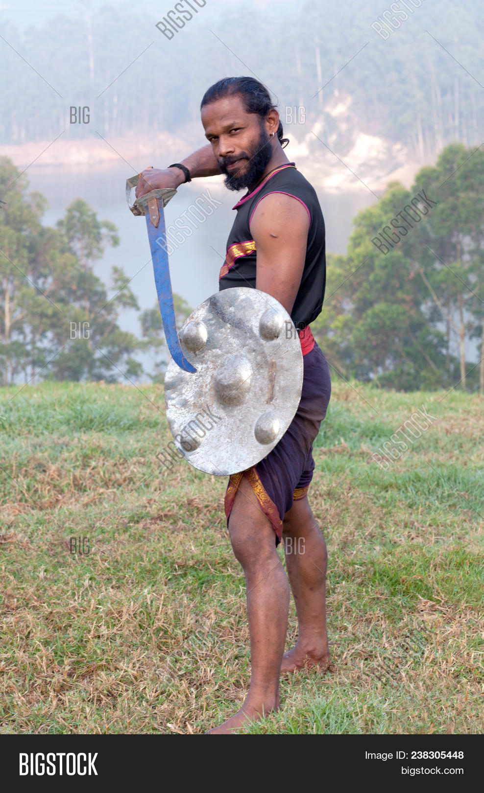 Kerala,ancient,art,asana,asia,ayurveda,body,combat,concentration,demonstration,discipline,discovery,east,fight,handsome,incredible,india,indian,jump,jumping,kalari,kalaripayatt,kalaripayattu,kalarippayattu,karate,knowledge,living,man,martial,master,national,nature,oriental,outdoors,performance,position,practice,show,single,skills,south,strong,sword,teaching,traditional,training,warrior,weapons,yoga,young