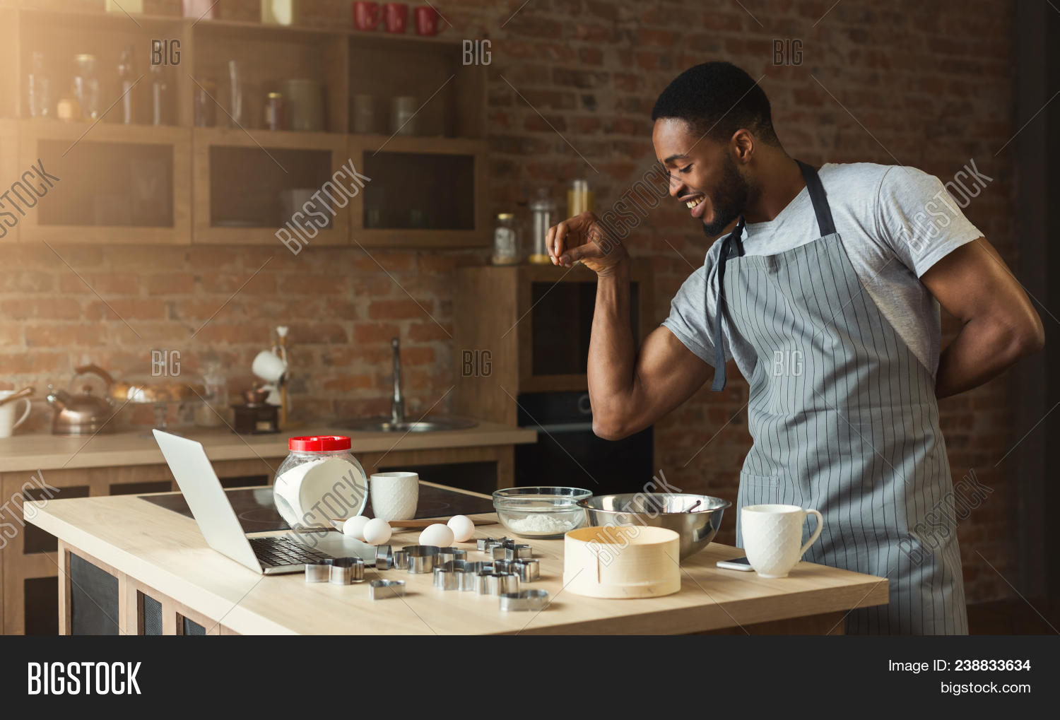 african-american,apron,bake,breakfast,casual,cheerful,chef,cook,cookie,cooking,cuisine,culinary,deversity,dinner,dough,egg,ethnicity,fan,flaworing,flour,food,gourmet,handsome,healthy,home,ingredient,kitchen,laptop,lifestyle,loft,lunch,male,man,meal,nutrition,pastry,preparing,recipe,rustic,seasoning,spices,table,technology,variety,worktop,young