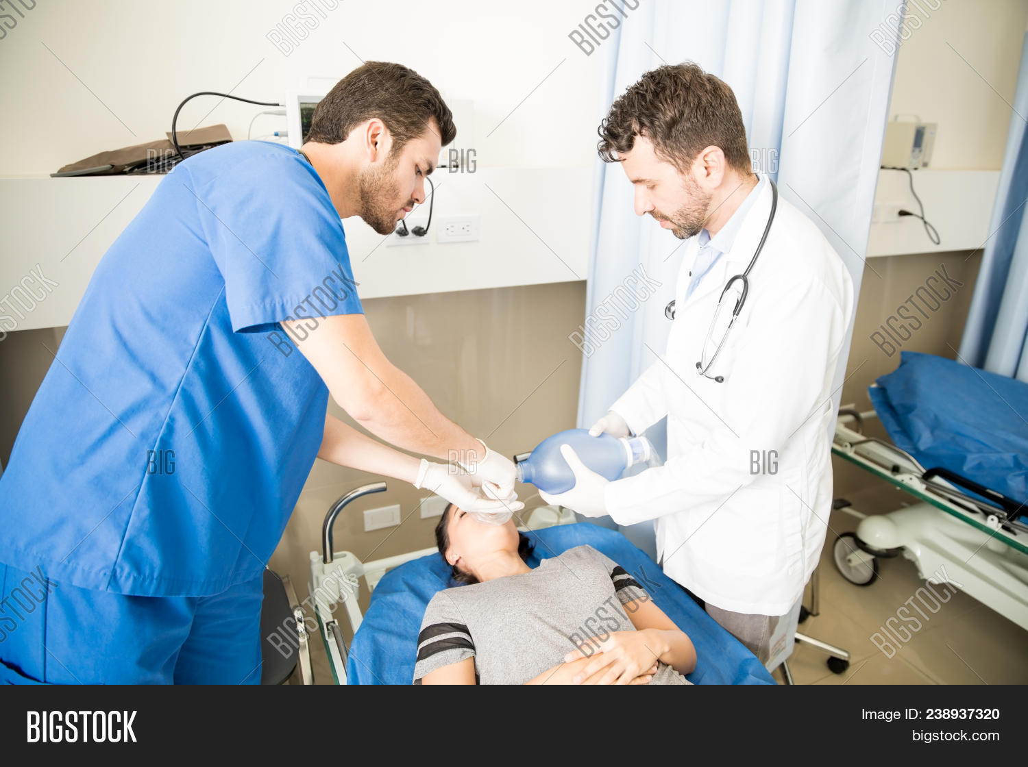 ambu,bag,breathing,busy,cardiac,care,clinic,cpr,doctor,emergency,er,female,health,hispanic,hospital,latin,lifestyle,male,medical,men,nurse,patient,people,personnel,resuscitation,room,specialist,staff,stretcher,unconscious,woman,worker