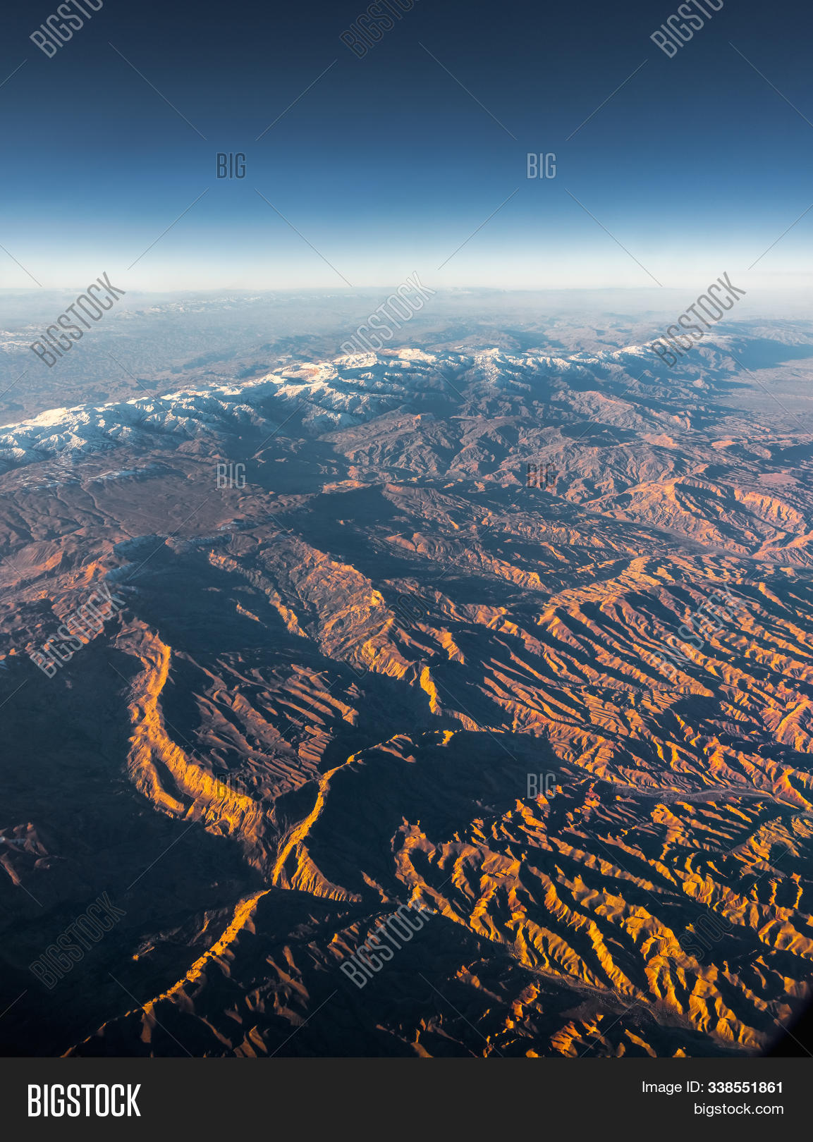 above,aerial,aeroplane,afganistan,air,aircraft,airliner,airplane,altitude,atmosphere,aviation,beautiful,blue,carrier,day,earth,flight,fly,flying,high,hills,holiday,horizon,jet,journey,land,landscape,nature,orange,plane,rugged,sky,snow,space,speed,sunlight,sunrise,surface,tour,transportation,travel,trip,vacation,valley,vehicle,view