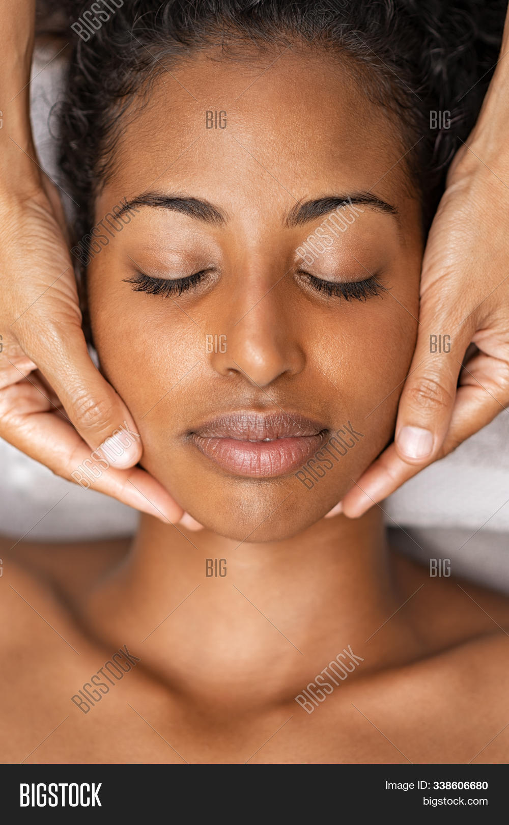 african,african american,african woman,american,attractive,beautiful,beauty,beauty salon,beauty treatment,black,body care,care,cleansing,close up,complexion,cosmetic,face,face massage,facial,facial massage,girl,hand,head,health care,healthy,luxury,massage,massage therapy,massaging,natural beauty woman,pampering,peaceful,people,portrait,pure,relax,salon,skin,skin care,skincare,spa,therapy,top view,treatment,woman relaxing,young,young woman