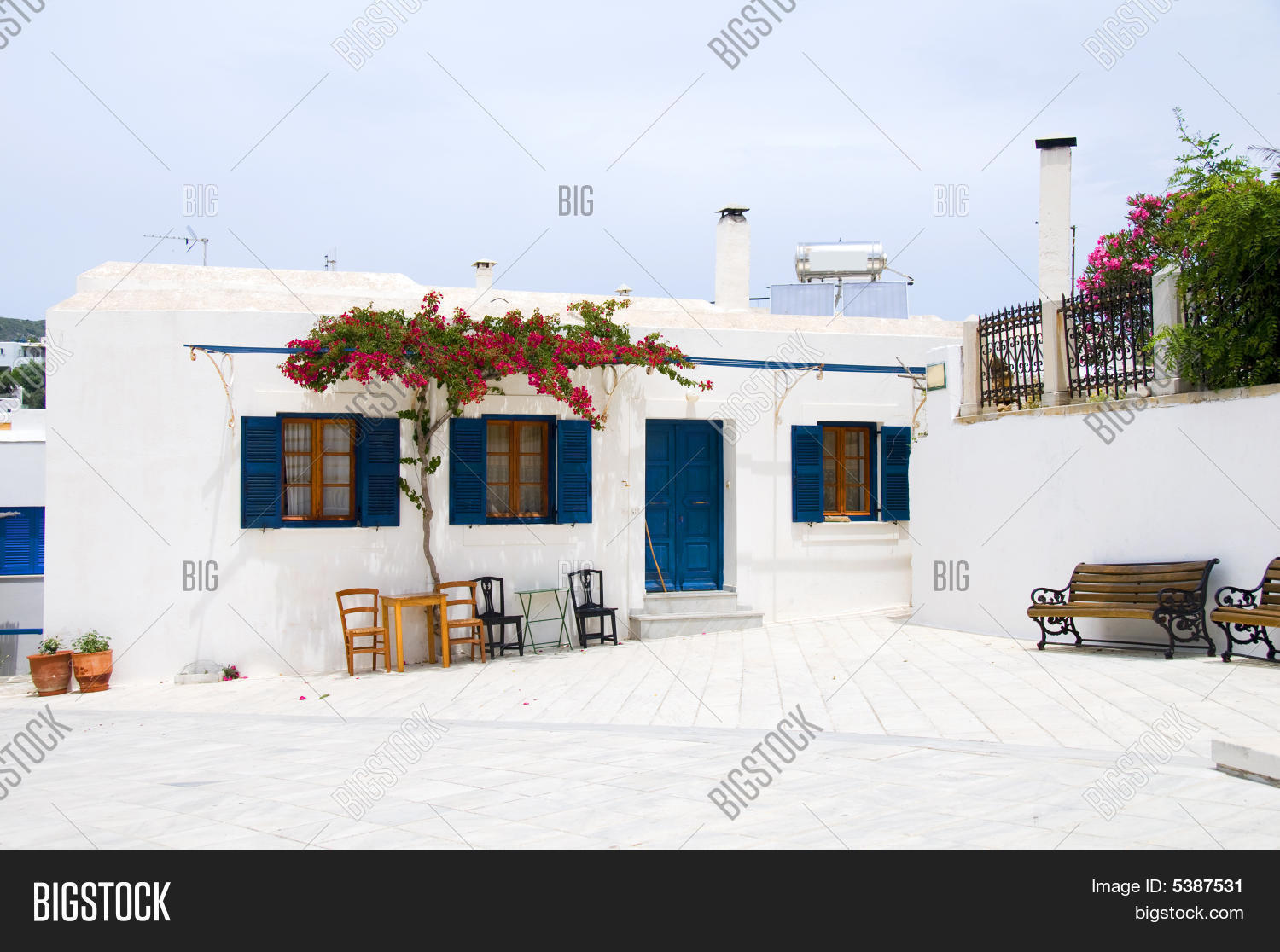 arbor,architecture,blue,building,cafe,chairs,coffee,common,cyclades,dining,flowers,furniture,generic,grape,greece,greek,horizontal,islands,lefkes,outdoor,park,paros,photograph,plants,restaurant,seat,shop,shutters,square,stucco,table,taverna,tourism,travel,typical,village,white,woven