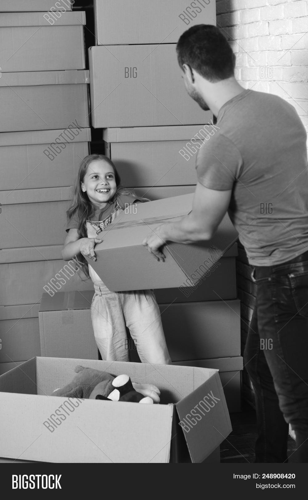 accommodation,apartment,background,box,boxes,cardboard,caucasian,closed,concept,daughter,estate,face,family,father,female,flat,girl,guy,happy,hold,home,house,in,interior,kid,ladder,male,man,move,moving,new,out,pack,package,packed,packing,pile,relocate,relocating,relocation,stack,unpack,unpacking