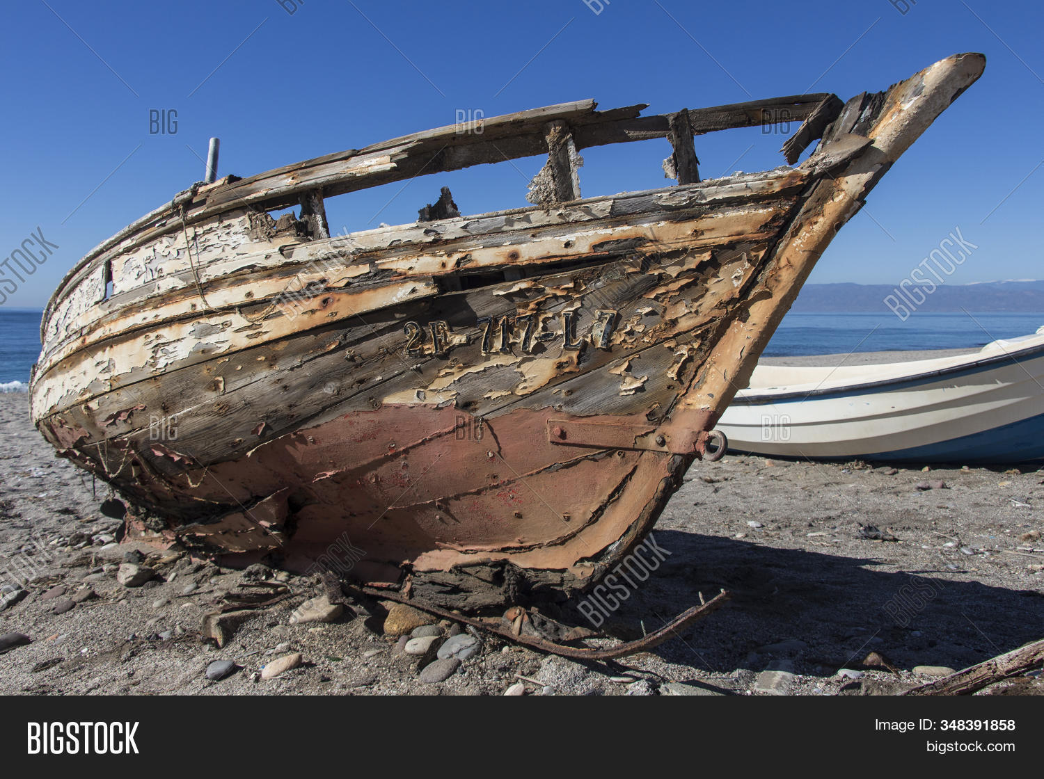 wood,mediterranean,fishing,boat,shipwreck,insides,damage,corrosion,decay,broken,nautical,vessel,abandoned,travel,old,landscape,sea,sky,tourism,outdoor,view,nature,ancient,ship,wooden,blue,water,europe,transport,sand,rusty,transportation,history
