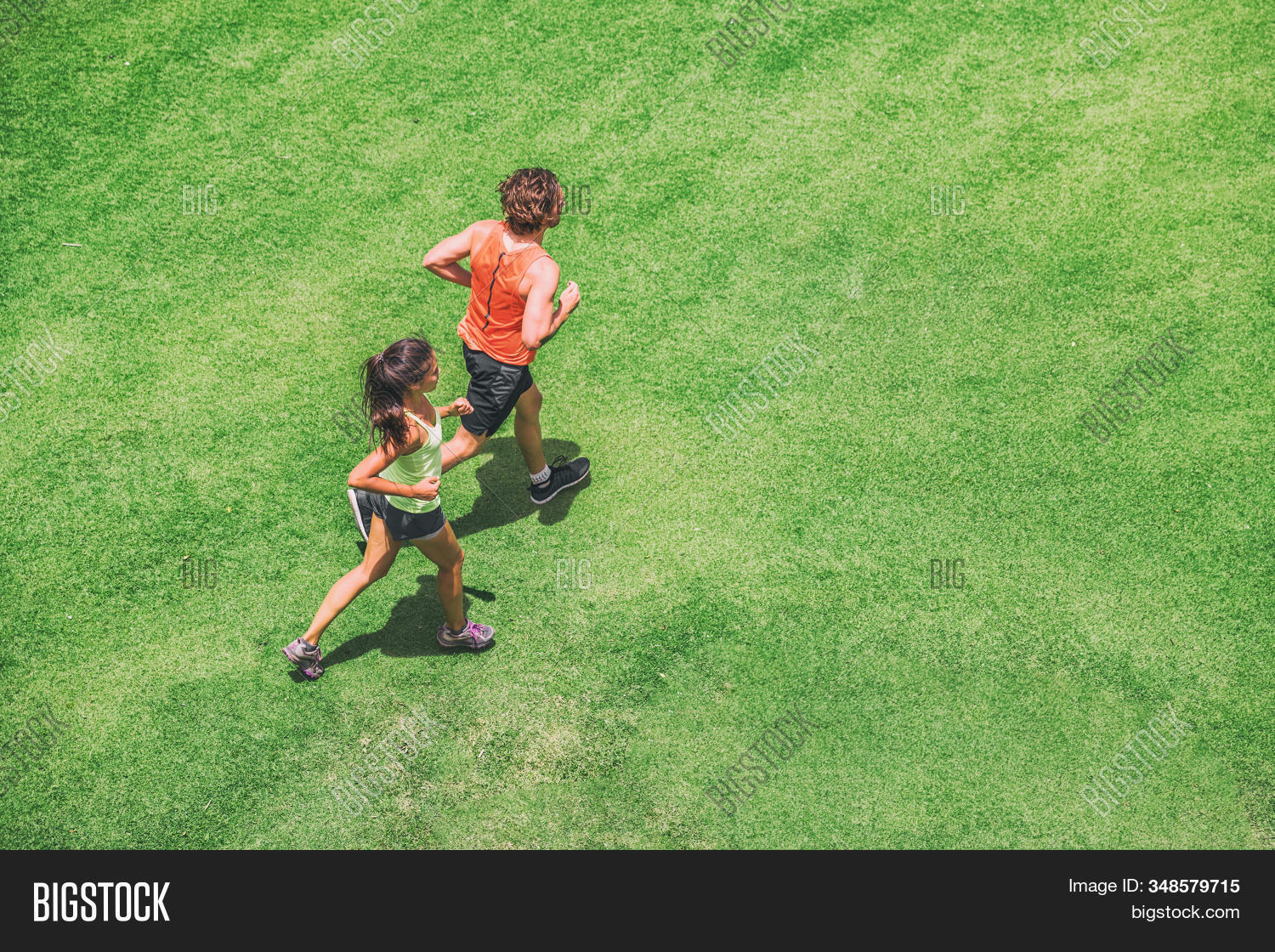 above,active,aerial,athletes,background,couple,drone,endurance,exercise,fit,fitness,friends,garden,girl,grass,green,healthy,high,hiit,intensity,interval,jog,joggers,lawn,lifestyle,male,man,men,motivation,outdoor,outside,park,people,run,runner,runners,sport,sportswear,summer,sun,top,trainer,two,view,woman,women,workout