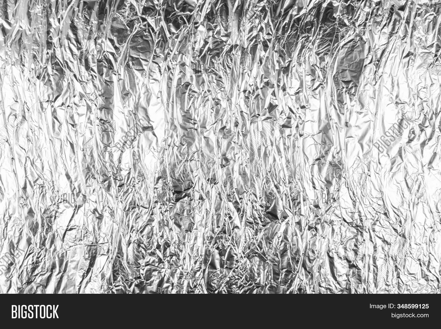 abstract,aluminium,foil,crumpled,texture,aluminum,backdrop,background,blank,chrome,closeup,cooking,crinkle,crumple,design,effect,empty,folded,fresh,gray,industrial,kitchen,light,macro,material,metal,metallic,object,packaging,paper,pattern,platinum,reflect,reflection,rough,scroll,sheet,shine,shiny,silver,space,surface,textured,tin,tinfoil,wallpaper,white,wrinkle,wrinkled