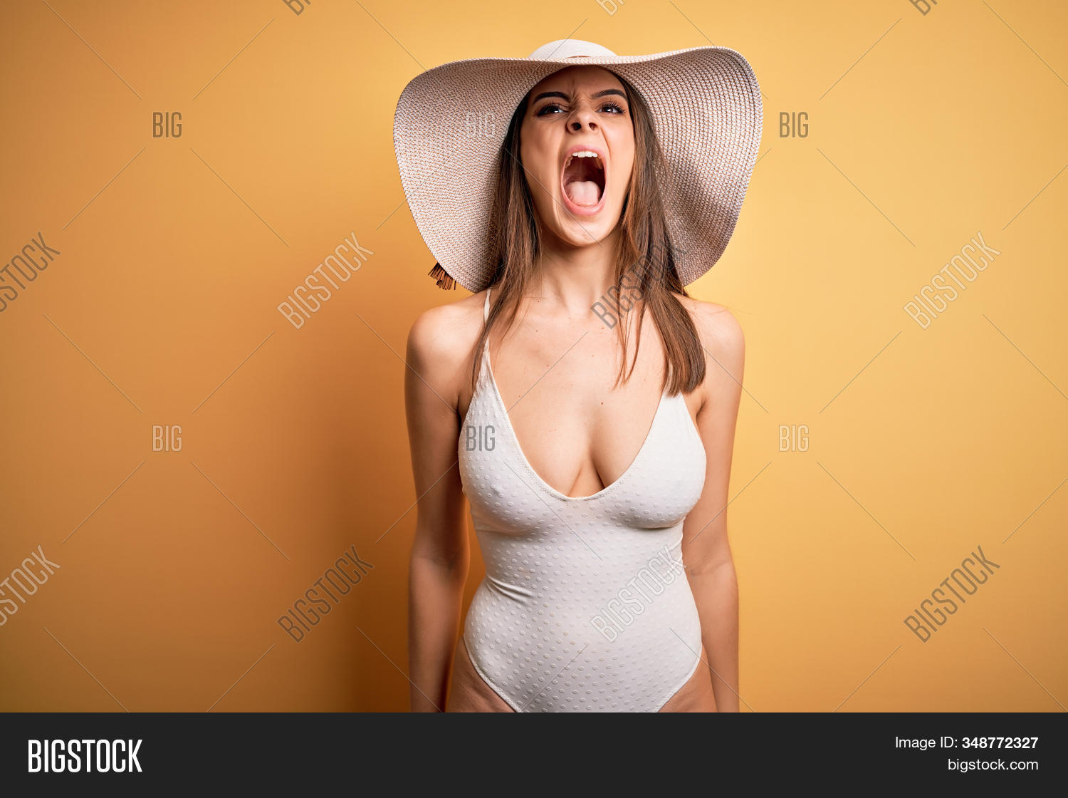 adult,aggressive,anger,angry,background,bad,beach,beautiful,bikini,body,brunette,crazy,emotion,enraged,evil,expression,face,fight,frustrated,frustration,furious,hat,hispanic,holidays,isolated,mad,mouth,people,person,portrait,rage,scream,serious,sexy,shouting,stress,strong,summer,swimsuit,swimwear,teeth,unhappy,upset,vacation,woman,yellow,young