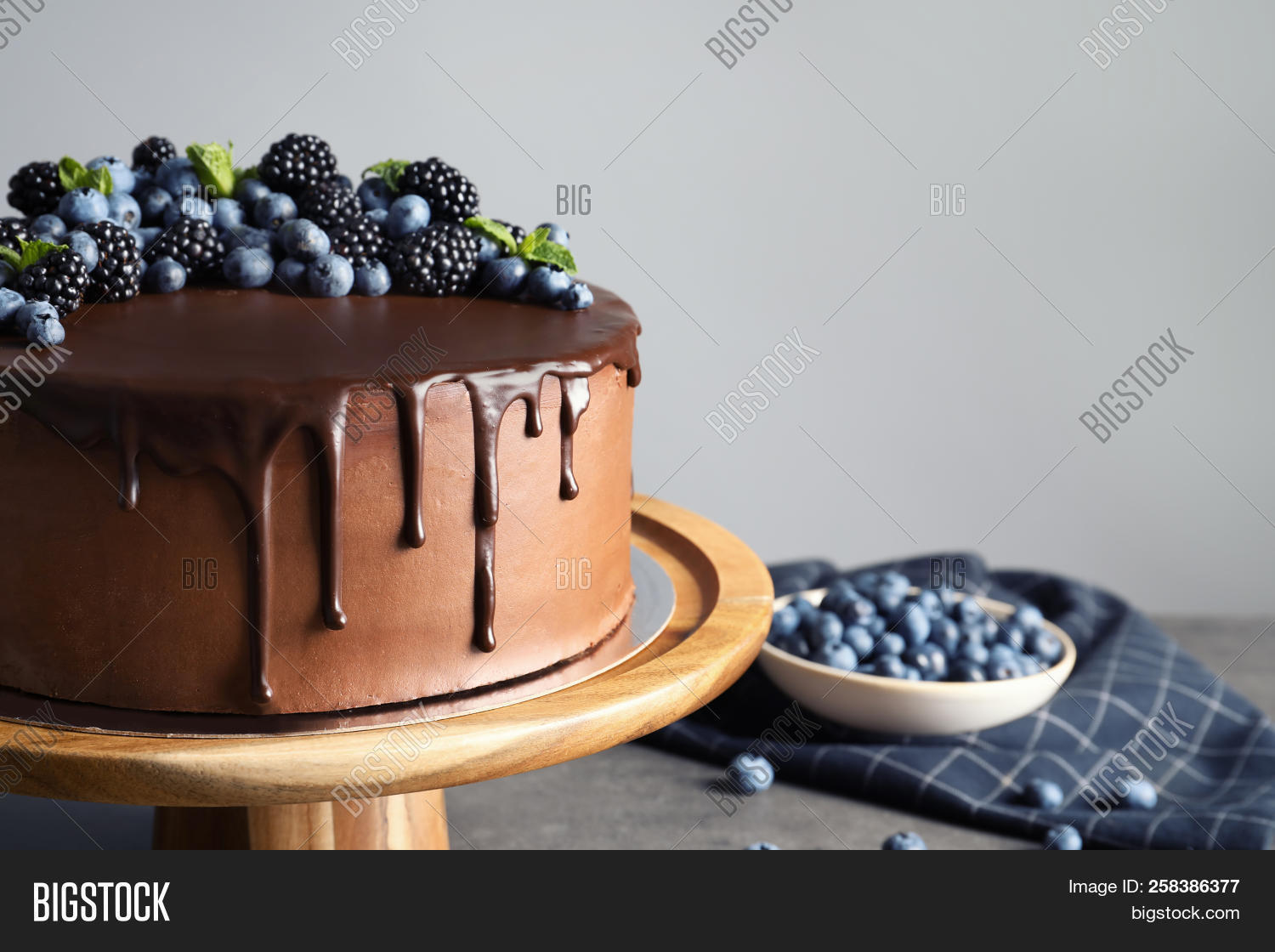background,baked,bakery,beautiful,berry,birthday,blackberry,blueberry,cake,celebration,chocolate,closeup,confectionery,cooking,copy,cream,culinary,decorated,decoration,delicious,dessert,eat,flavor,fresh,frosting,gourmet,gray,holiday,home,homemade,icing,ingredient,luxury,made,object,pastry,pie,present,recipe,space,sponge,stand,sweet,table,tasty,temptation,text,wooden