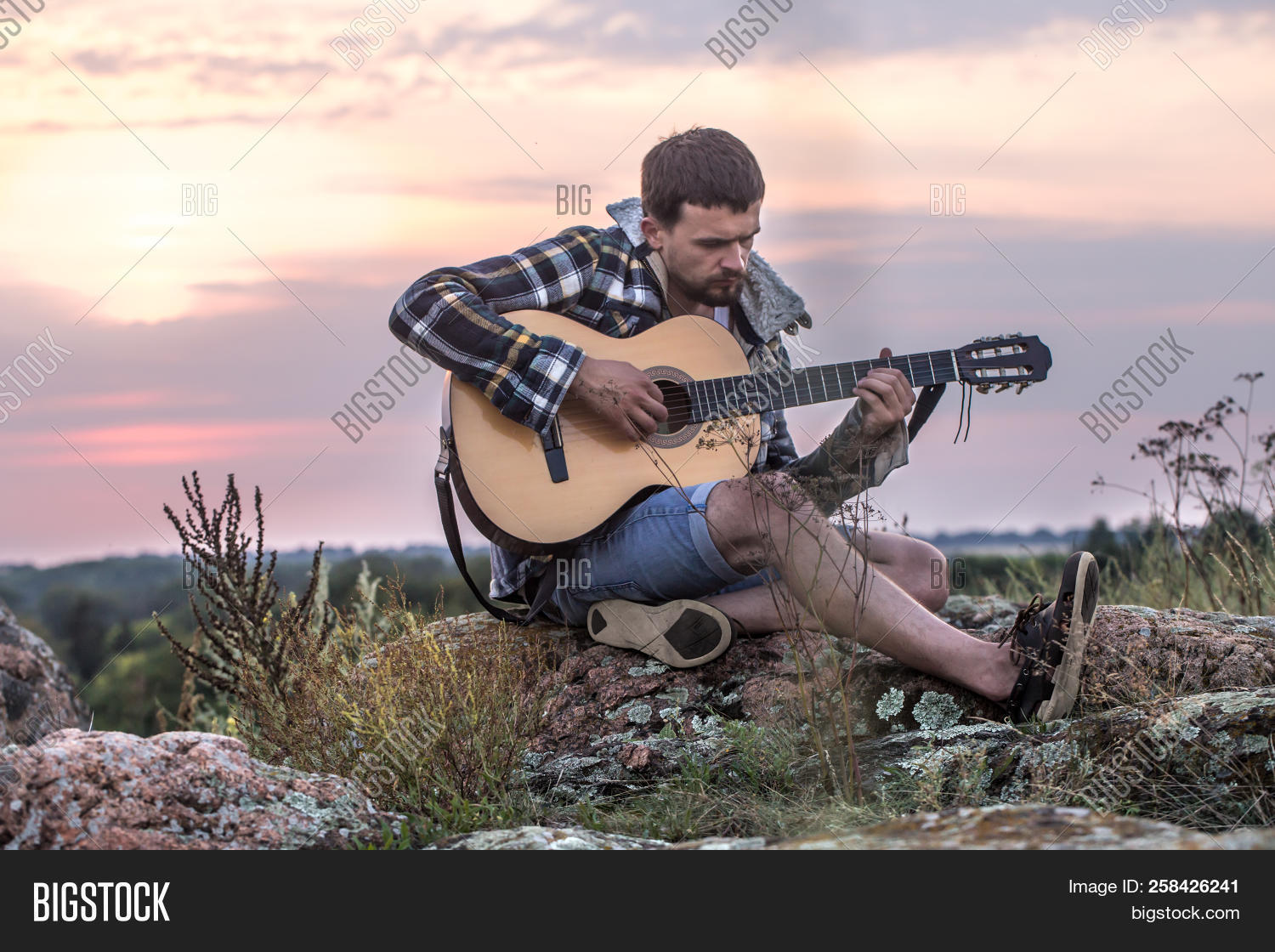 acoustic,art,back,background,beautiful,boho,copyspace,country,countryside,cowboy,field,freedom,gold,guitar,guy,hand,hat,horizon,instrument,life,lifestyle,male,man,music,musician,nature,outdoor,outside,party,people,person,play,player,pop,relax,retro,rock,rocknroll,sky,song,sound,summer,sunlight,sunny,sunset,vintage,young