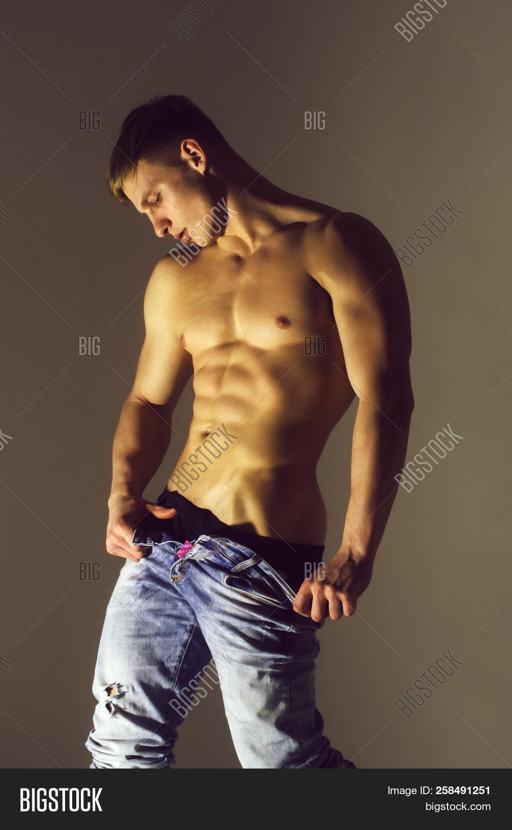 ab,arms,athlete,athletic,belly,biceps,blue,bodybuilder,bodybuilding,caucasian,chest,desire,fit,fitness,grey,handsome,health,healthy,jeans,macho,man,muscle,muscular,naked,pack,sexi,sexy,six,sport,stripping,striptease,strong,torso,training,triceps,wall,workout,young
